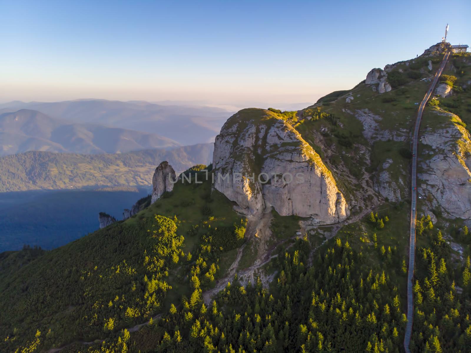 Aerial rocky summit and access stairs in Ceahlau massif, Romanian Carpathians