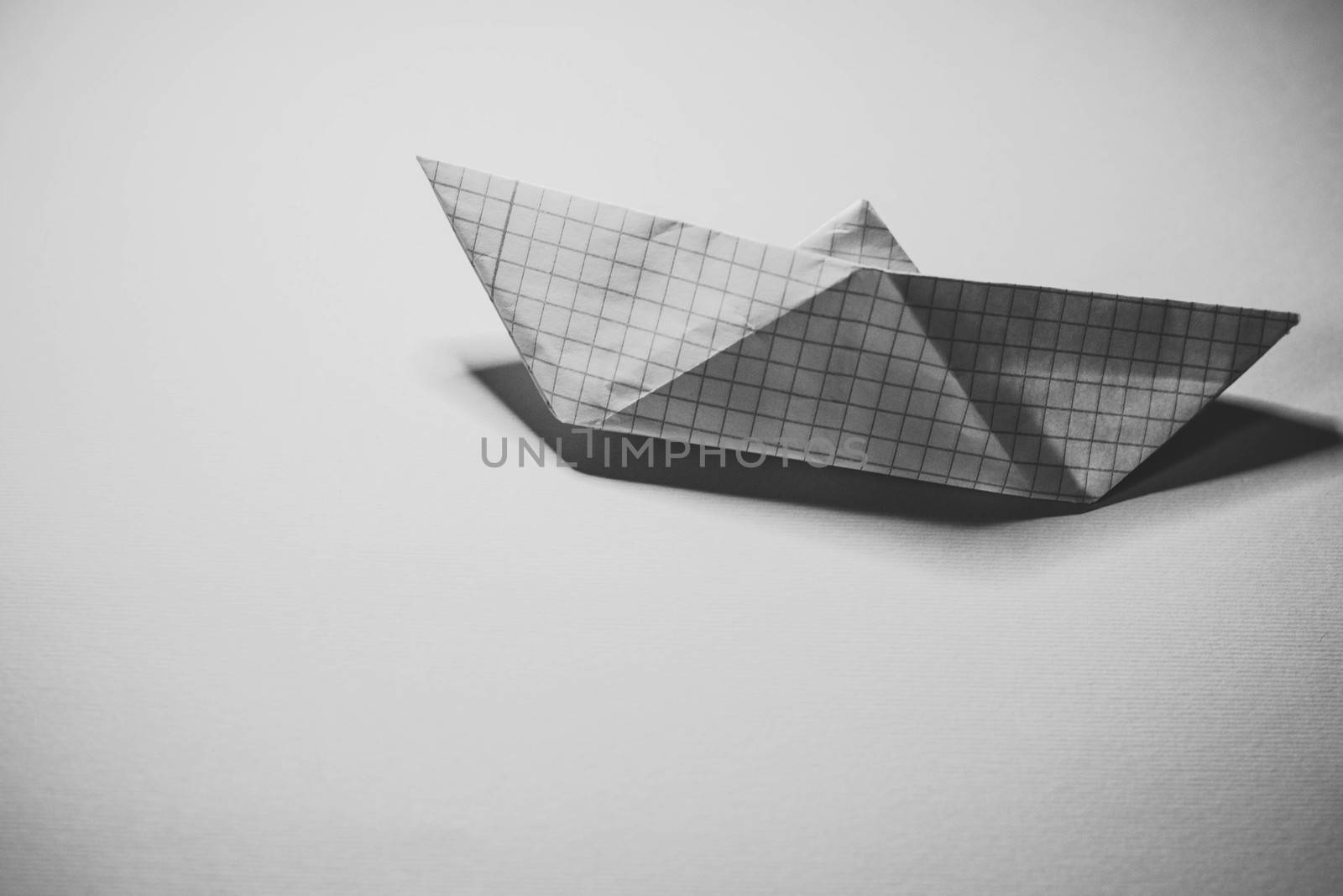 Paper boat on colored backgrounds by SemFid