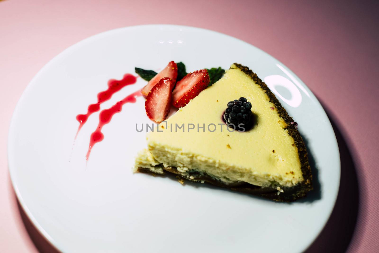 A piece of cheesecake on a white plate by SemFid