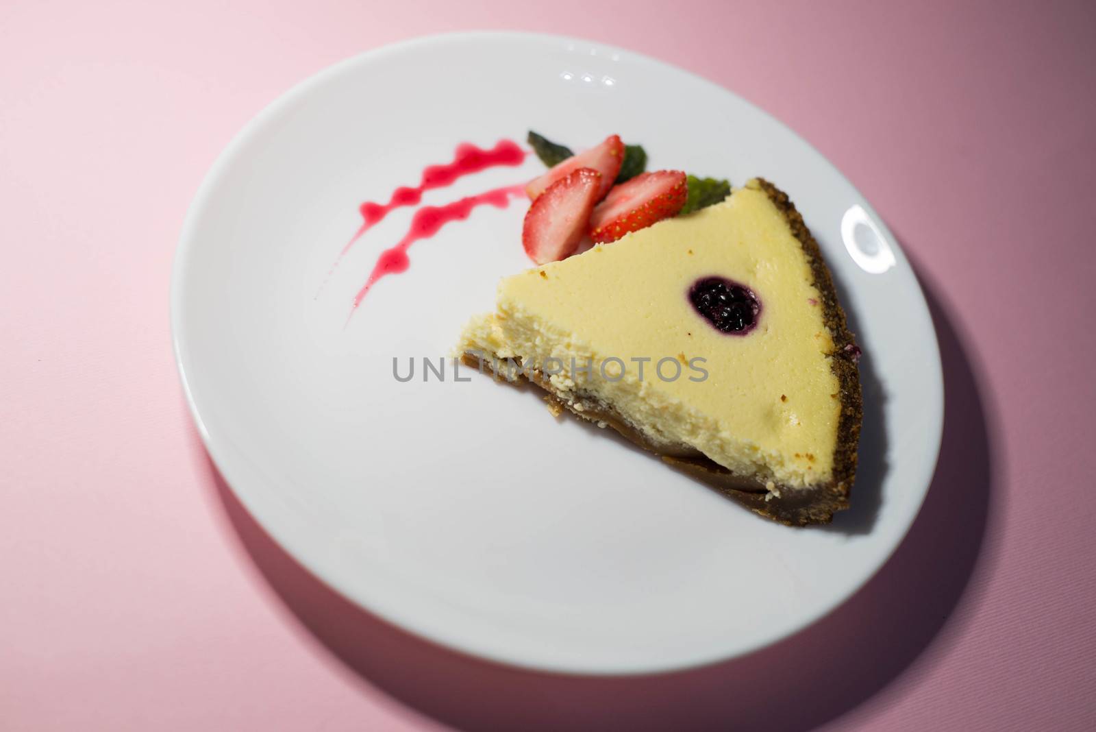 A piece of cheesecake on a white plate