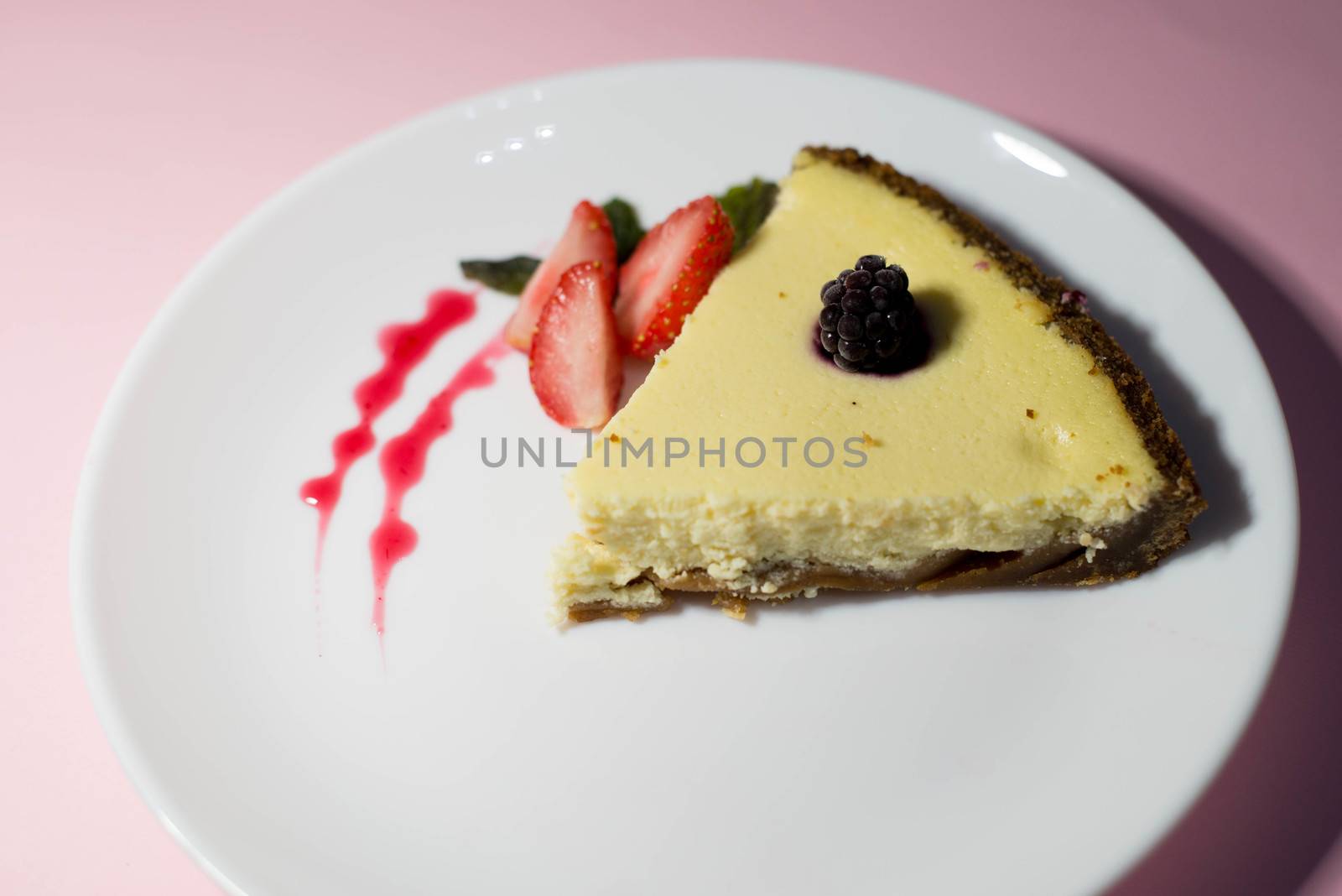 A piece of cheesecake on a white plate by SemFid