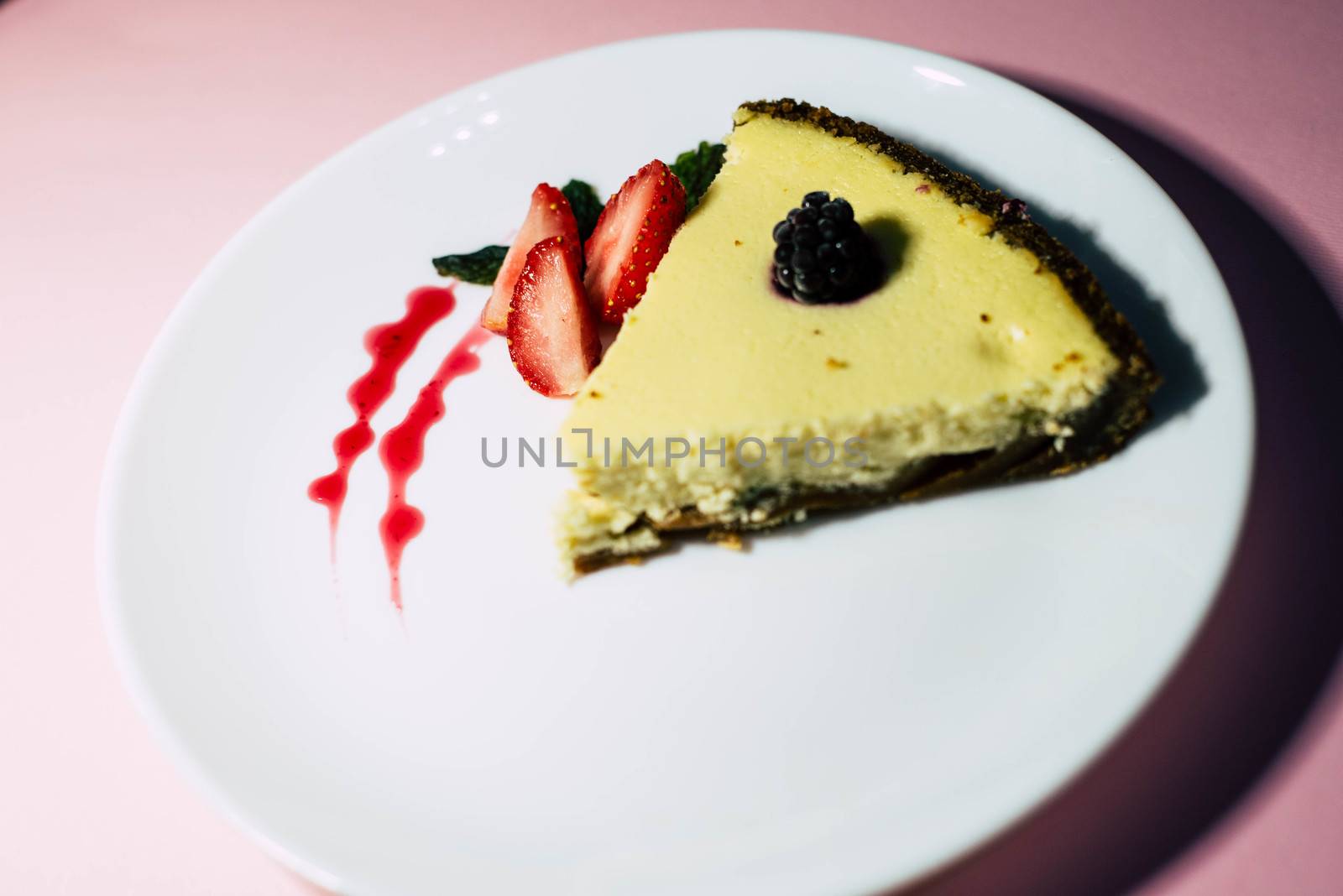 A piece of cheesecake on a white plate by SemFid