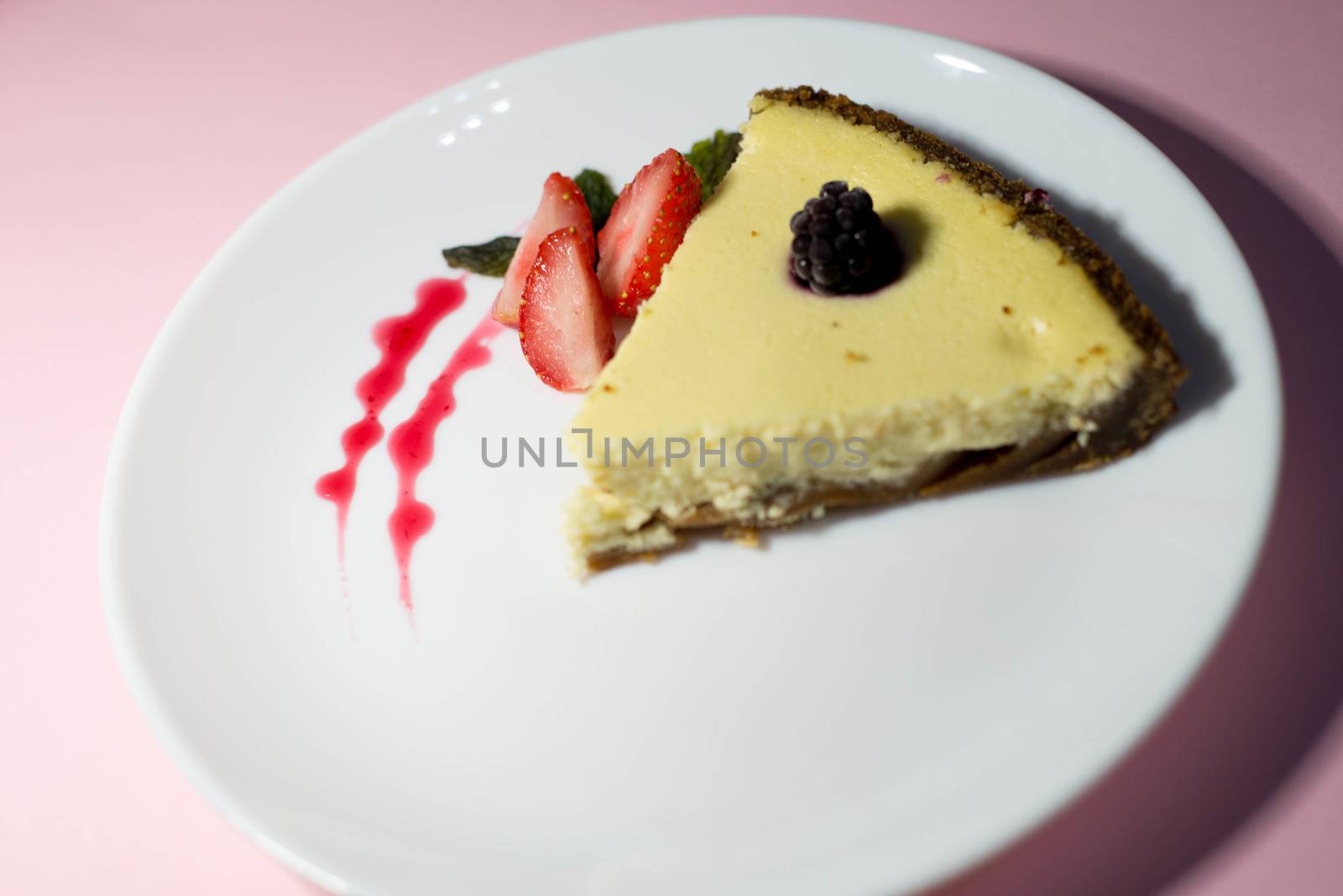 A piece of cheesecake on a white plate by SemFid