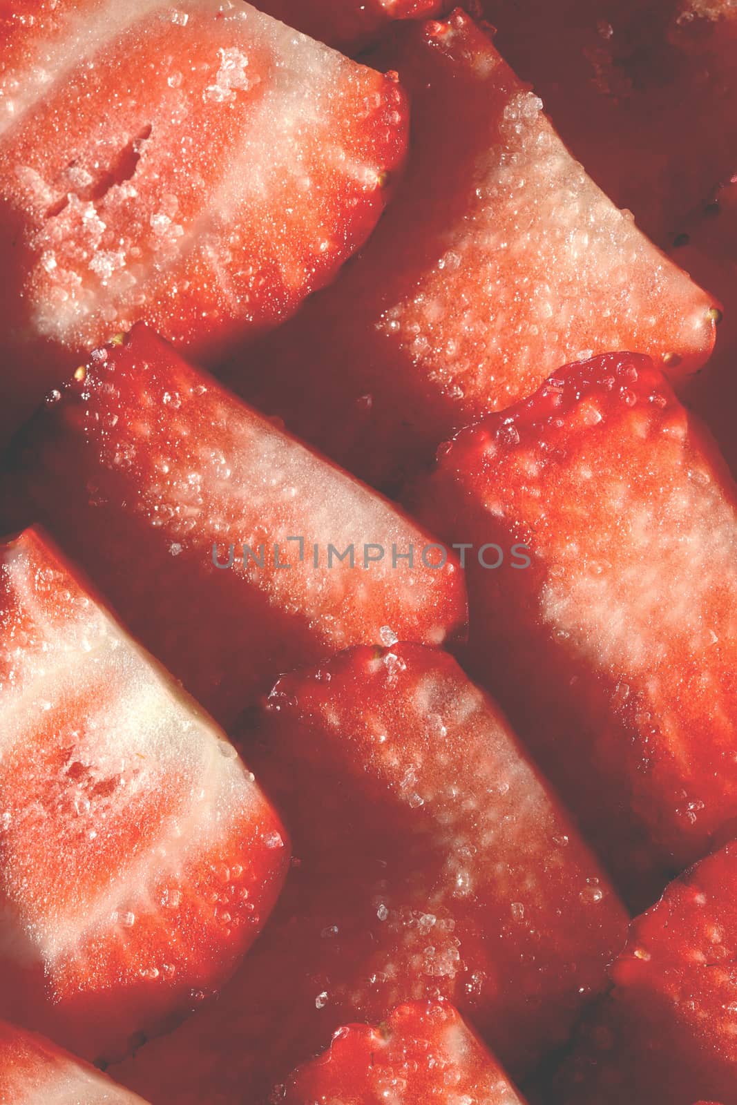 Strawberry slices in sugar filling background. Strawberry with sugar texture. Vitamin berry backdrop. by sanches812