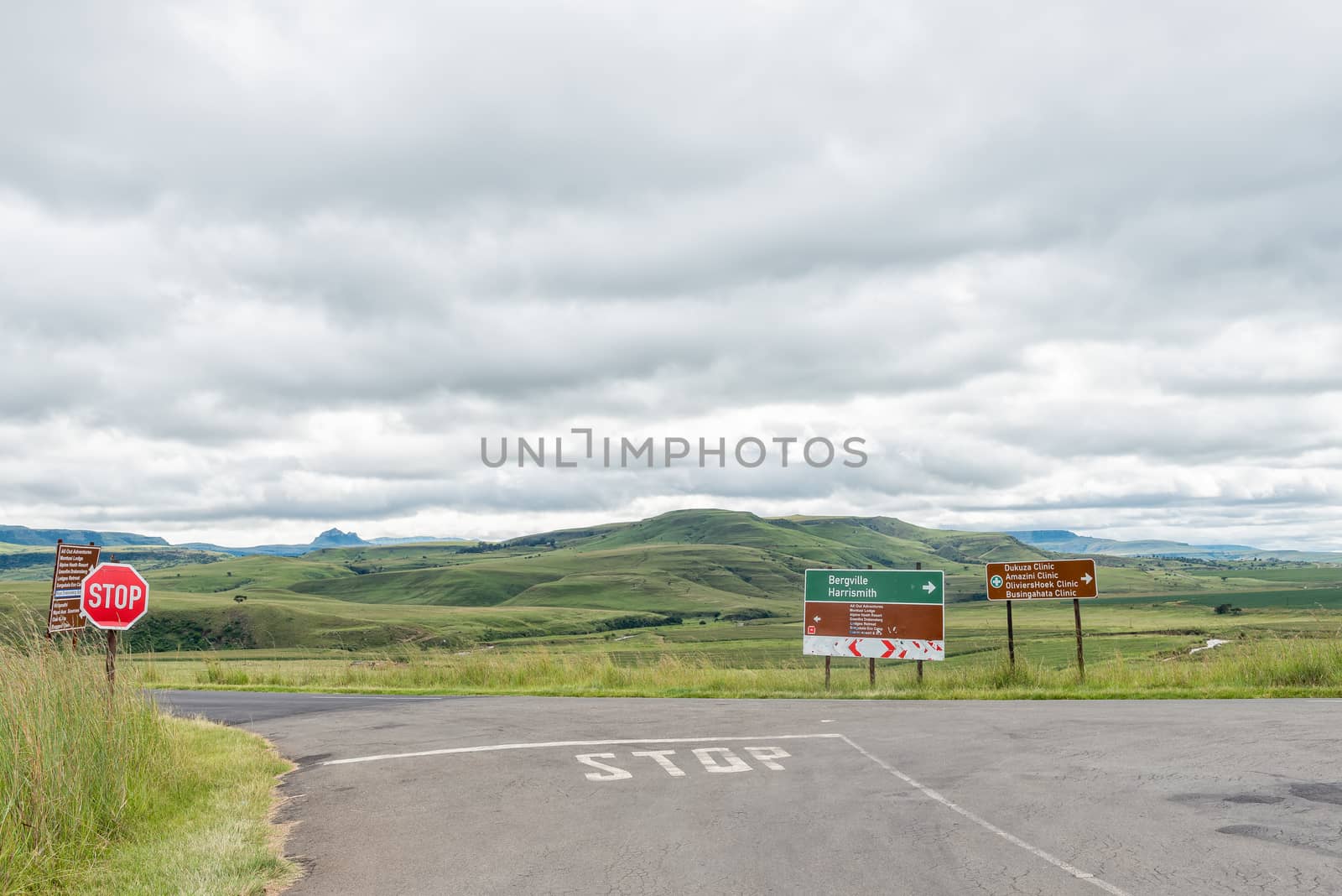 Junction between roads D119 and D475 near Bonjaneni in Kwazulu-Natal. A stop sign and directional signs are visible
