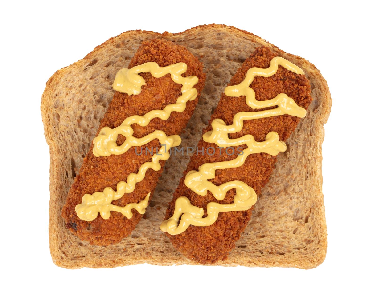 Brown crusty dutch kroket with mustard topping isolated, on a piece of bread, on a white background