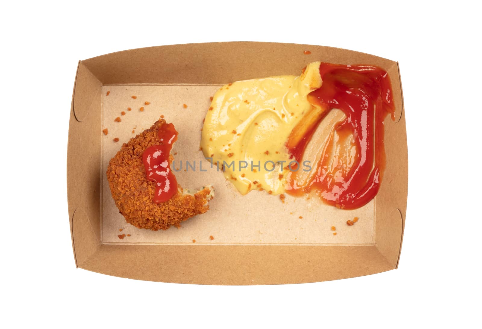 Partly eaten brown crusty dutch kroket with mustard and ketchup isolated on a white background