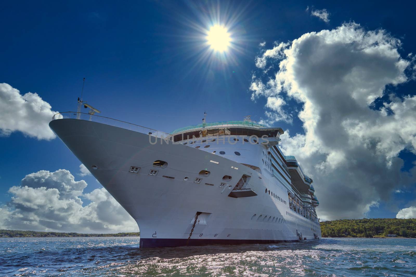 Cruise Ship Anchored Under Sun by dbvirago