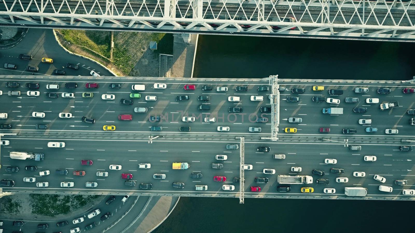 Aerial top view of bridge road automobile traffic of many cars, transportation concept