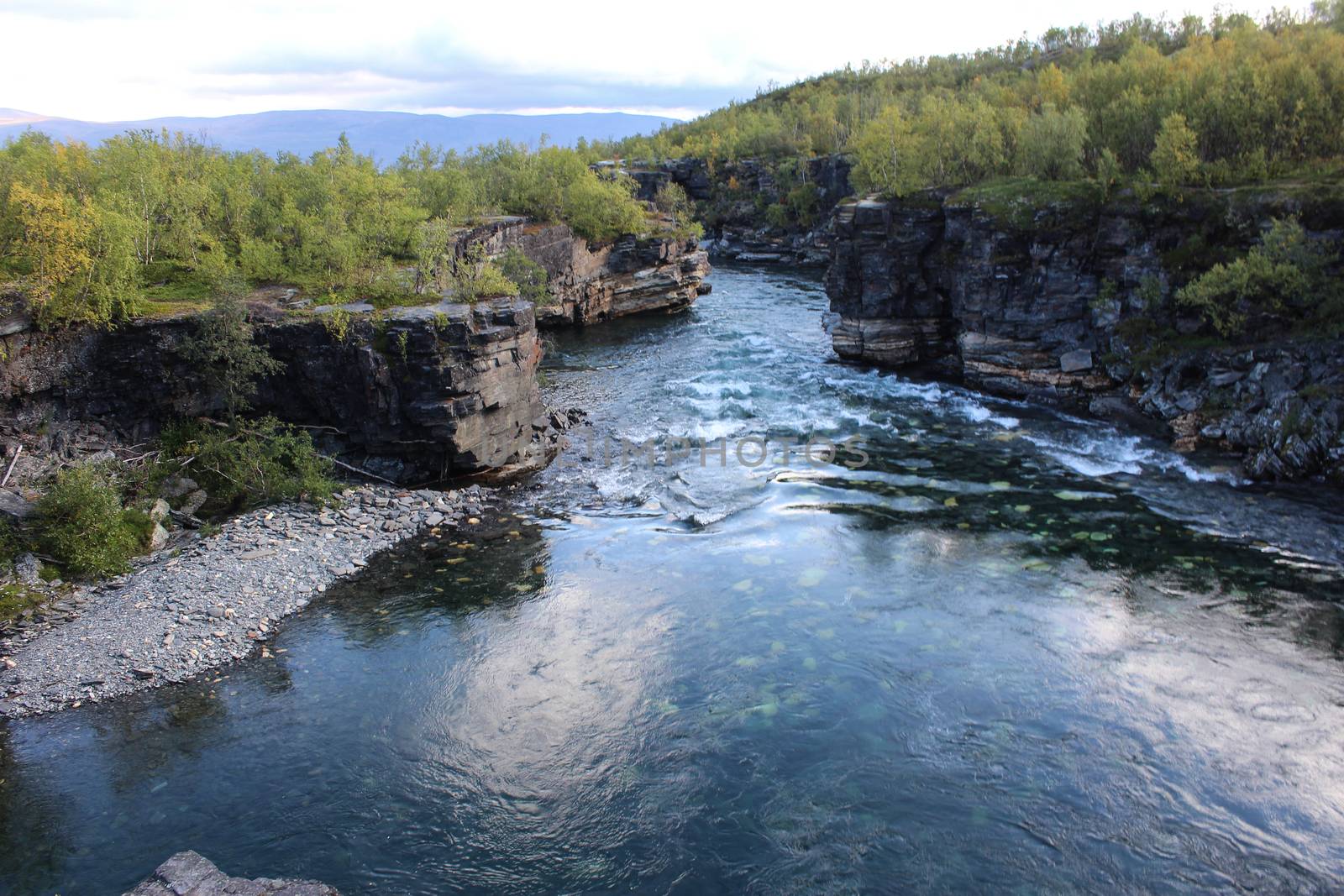 Overview of Kungsleden river in the arctic tundra. Abisko national park, Nothern Sweden