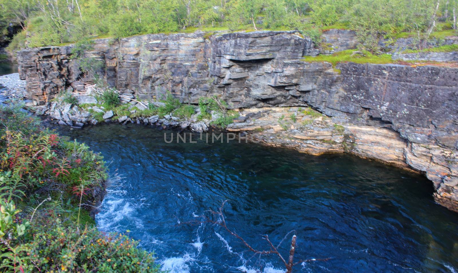 Overview of Kungsleden river in the arctic tundra. Abisko national park, Nothern Sweden