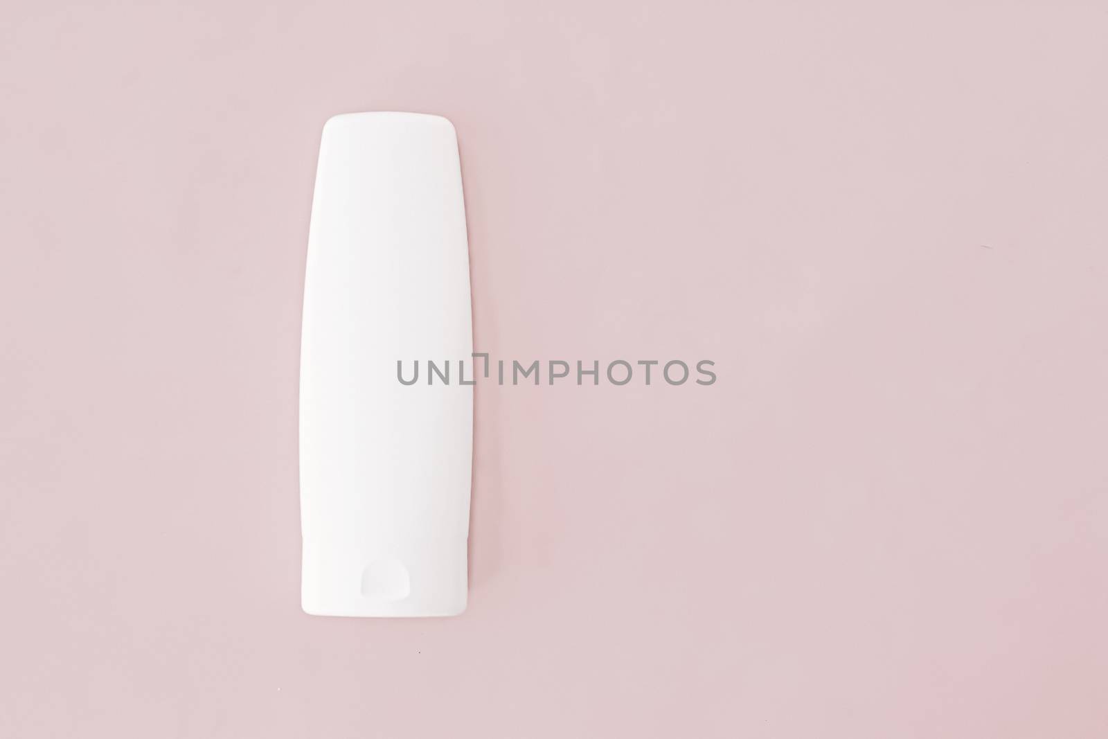 Moisturizing hand cream or body lotion on pink background, beauty product and skin care cosmetics, flatlay