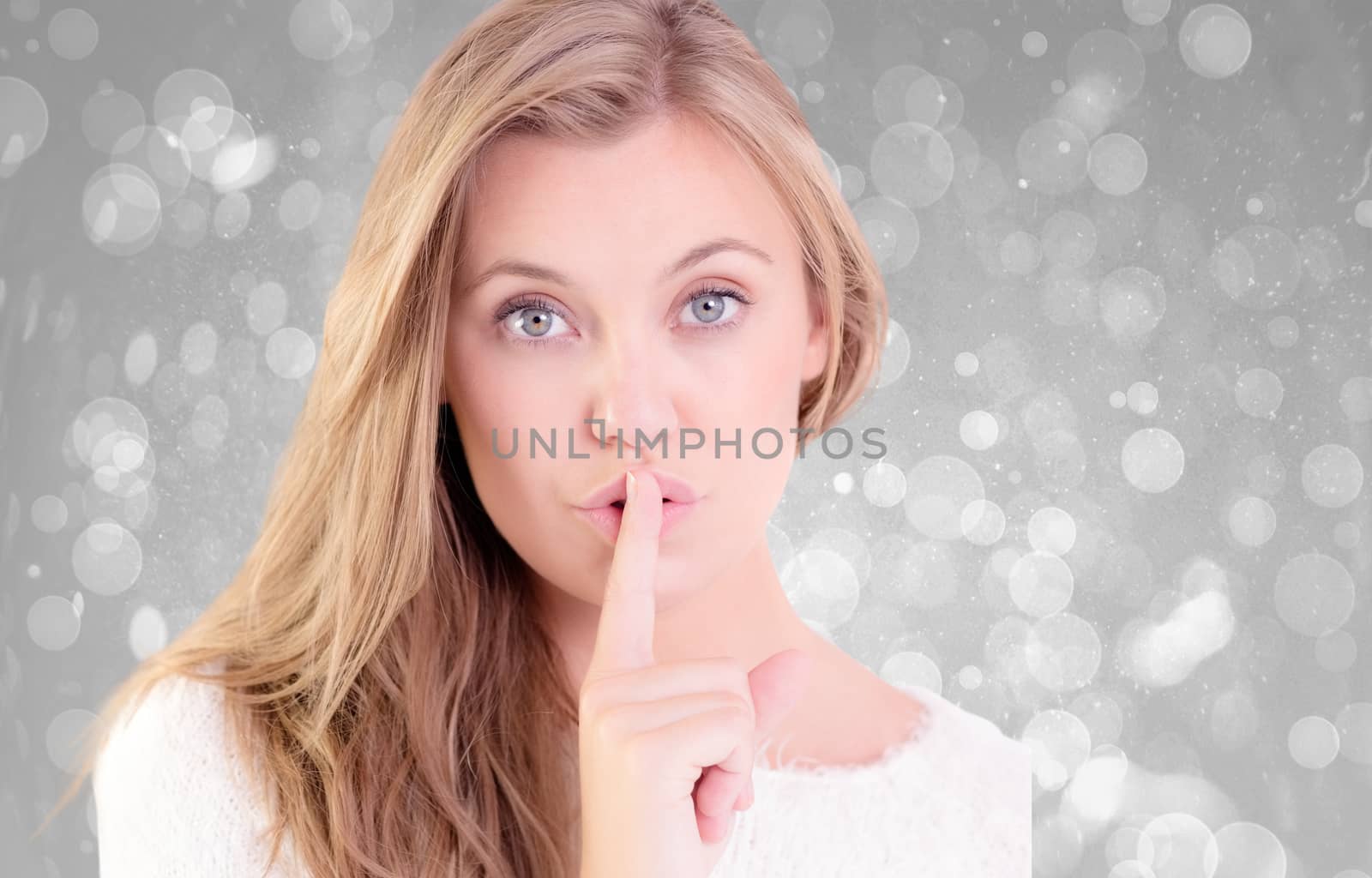 Composite image of pretty blonde keeping a secret by Wavebreakmedia