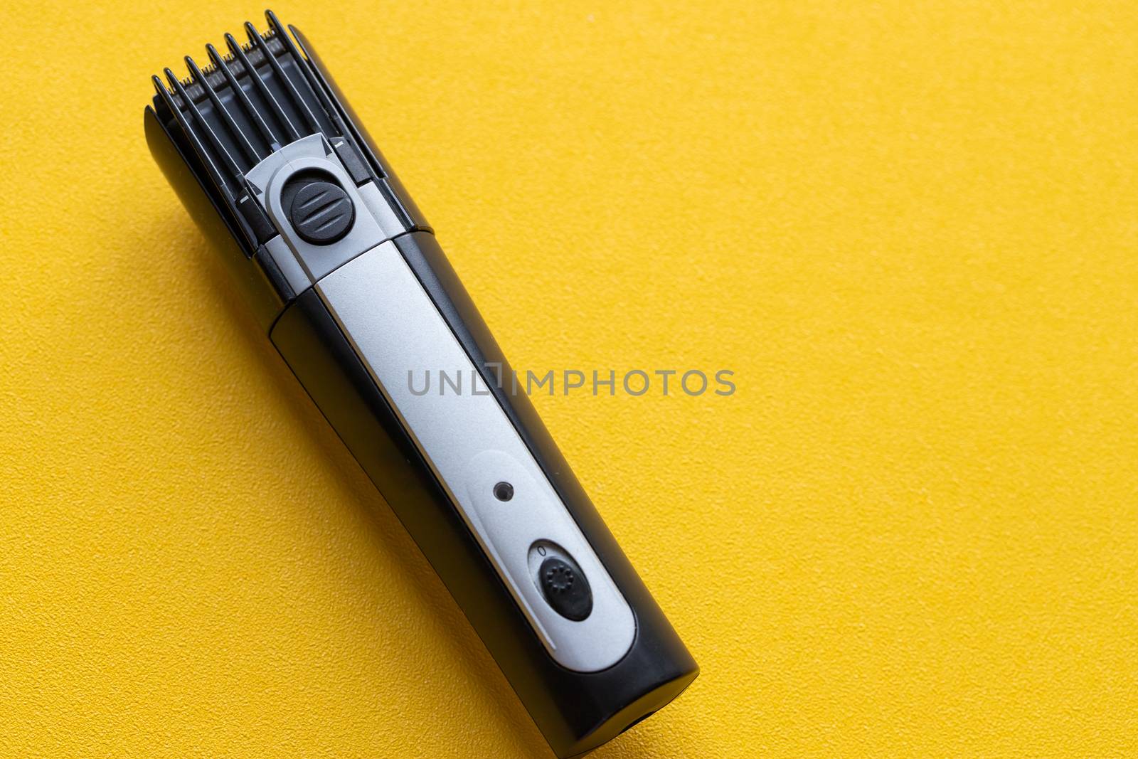 Shaver on a yellow background. by bonilook