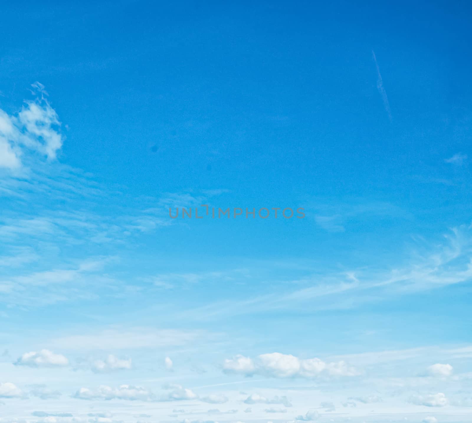 Bright blue sky with clouds, nature and environmental background