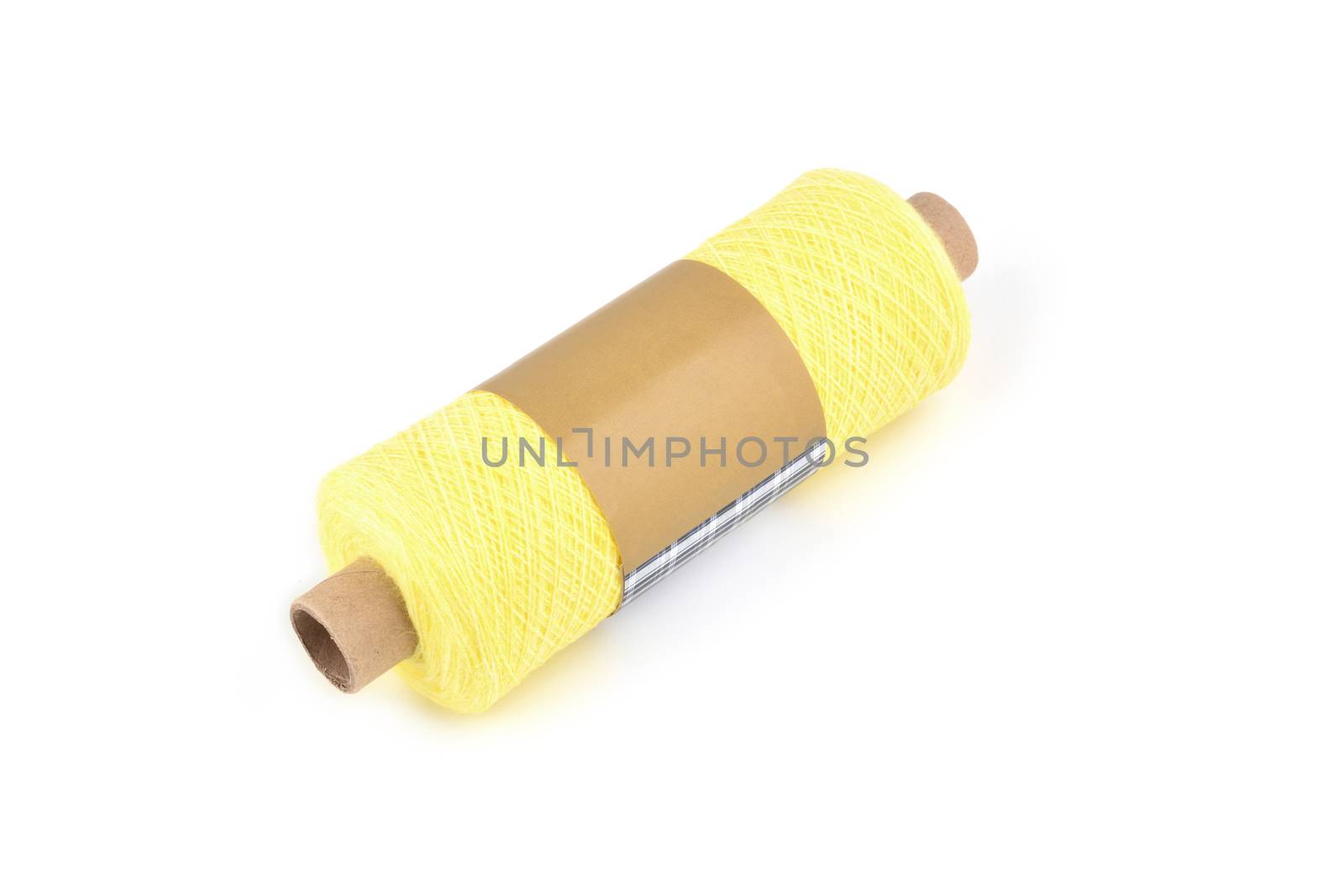 Color bobbin of yarn with label. Side view. Textile reel on isolated white background. Use for store