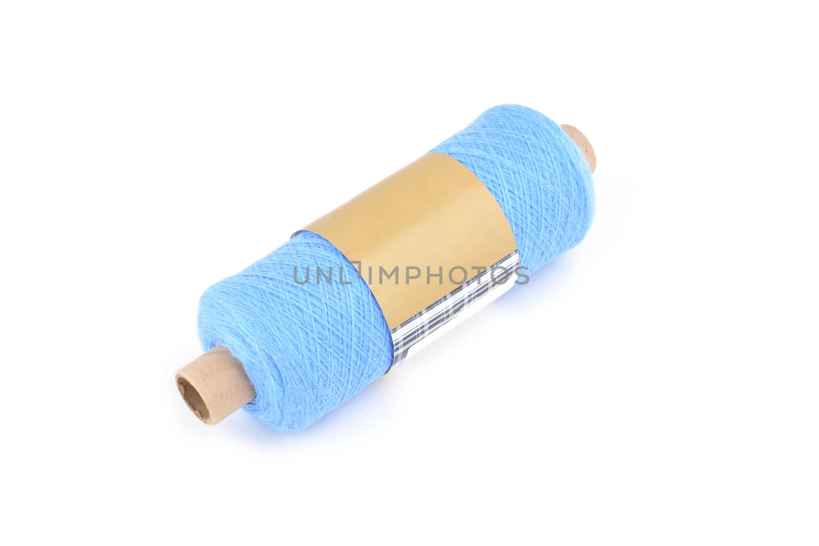 Color bobbin of yarn with label. Side view. Textile reel on isolated white background. Use for store