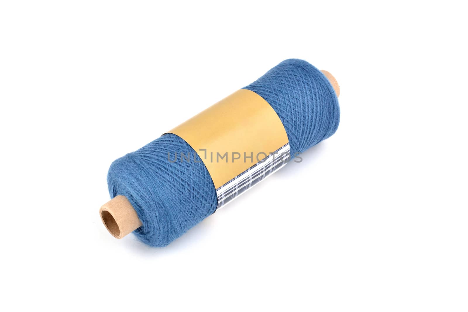 Color bobbin of yarn with label. Side view. Textile reel on isolated white background. Use for store