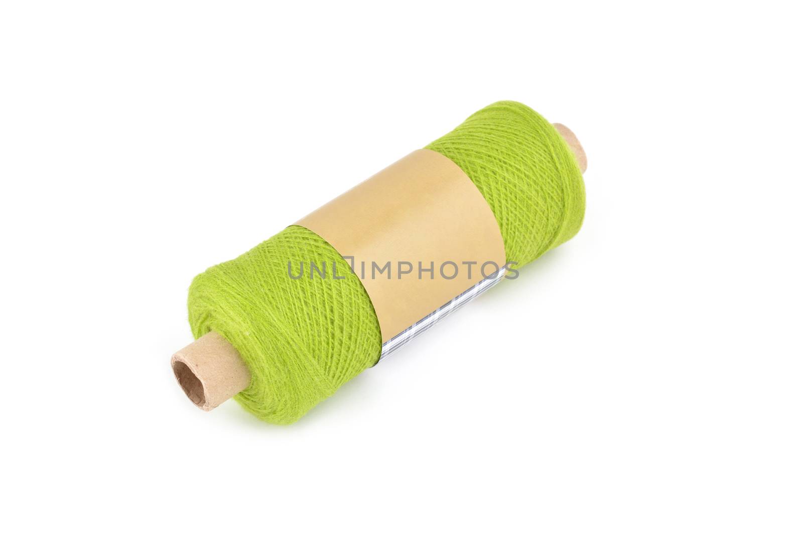 Color bobbin of yarn with label. Side view. Textile reel on isolated white background. Use for store