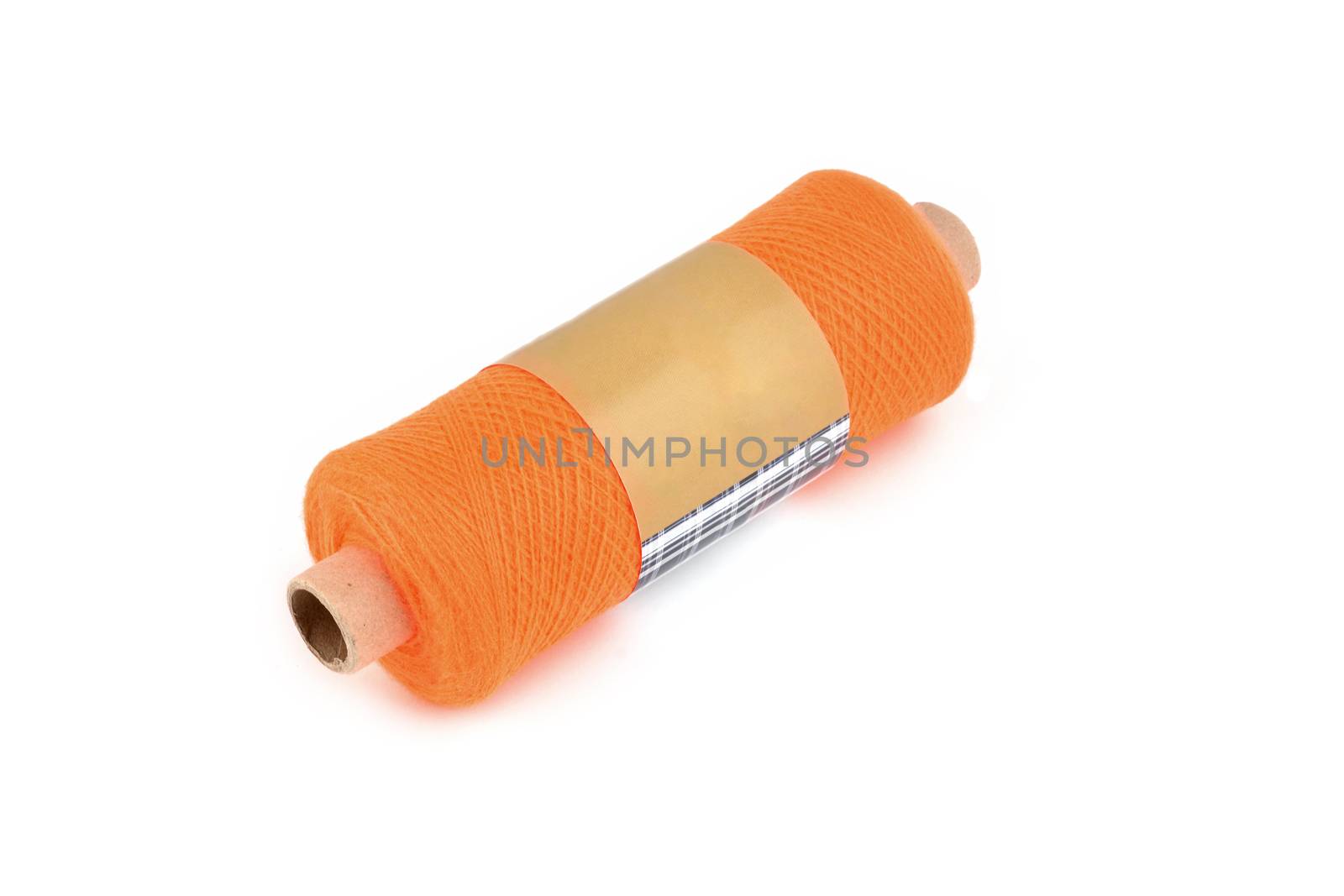 Color bobbin of yarn with label. Side view. Textile reel on isolated white background. Use for store