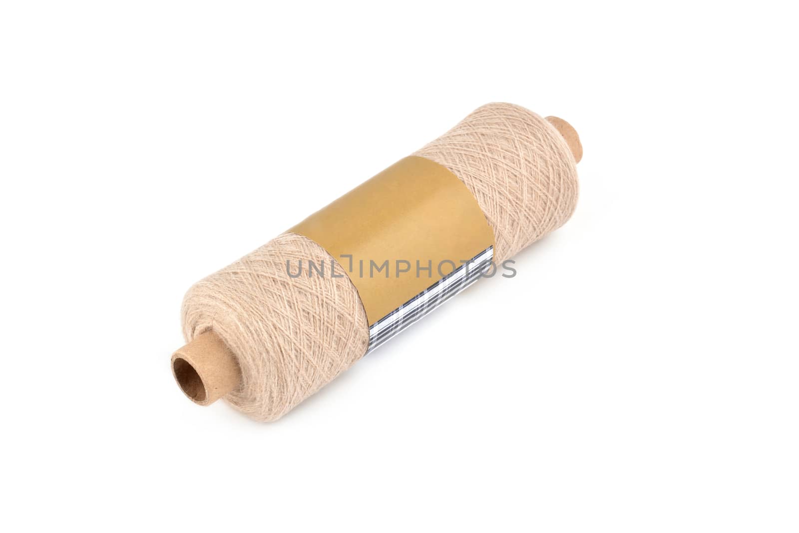 Color bobbin of yarn with label. Side view. Textile reel on isolated white background. Use for store