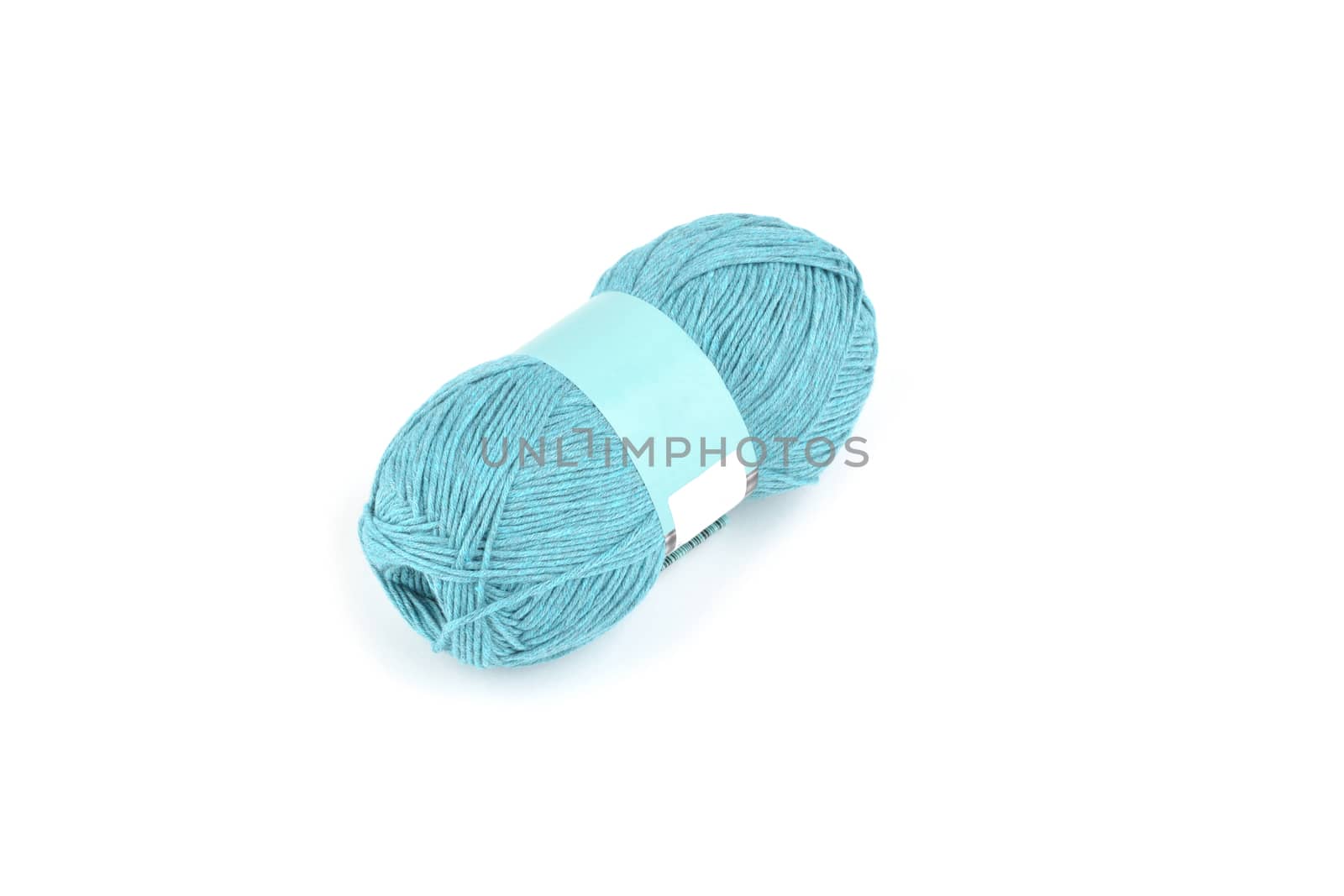 Tangle of color yarn with blank label on white background skein. Knitting isolated on white. Use for store