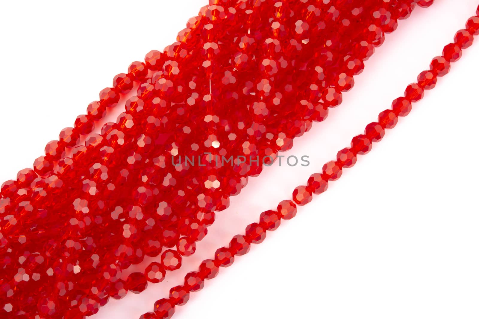 Beautiful Red Glass Sparkle Crystal Isoalted Beads on white background. Use for diy beaded jewelry