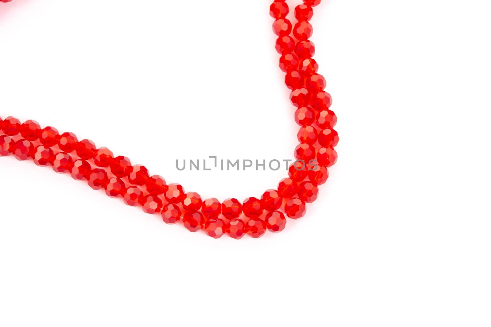 Beautiful Red Glass Sparkle Crystal Isoalted Beads on white background. Use for diy beaded jewelry