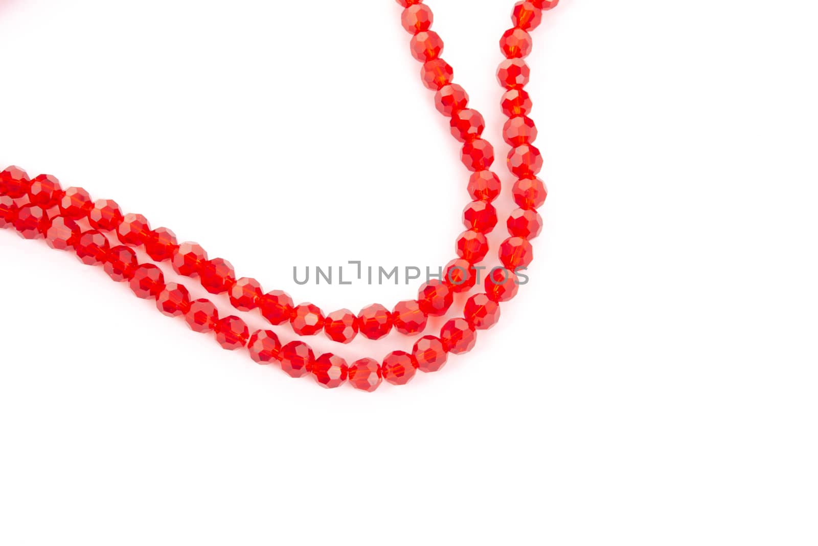 Beautiful Red Glass Sparkle Crystal Isoalted Beads on white background. Use for diy beaded jewelry