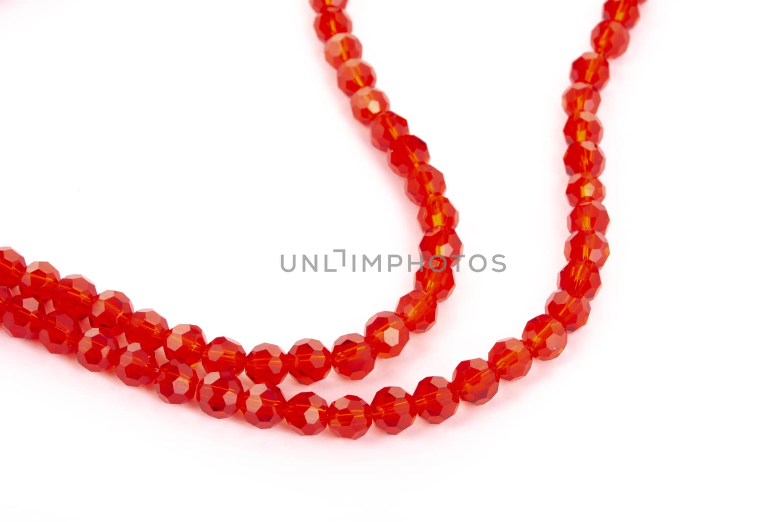 Beautiful Red Glass Sparkle Crystal Isoalted Beads on white background. Use for diy beaded jewelry