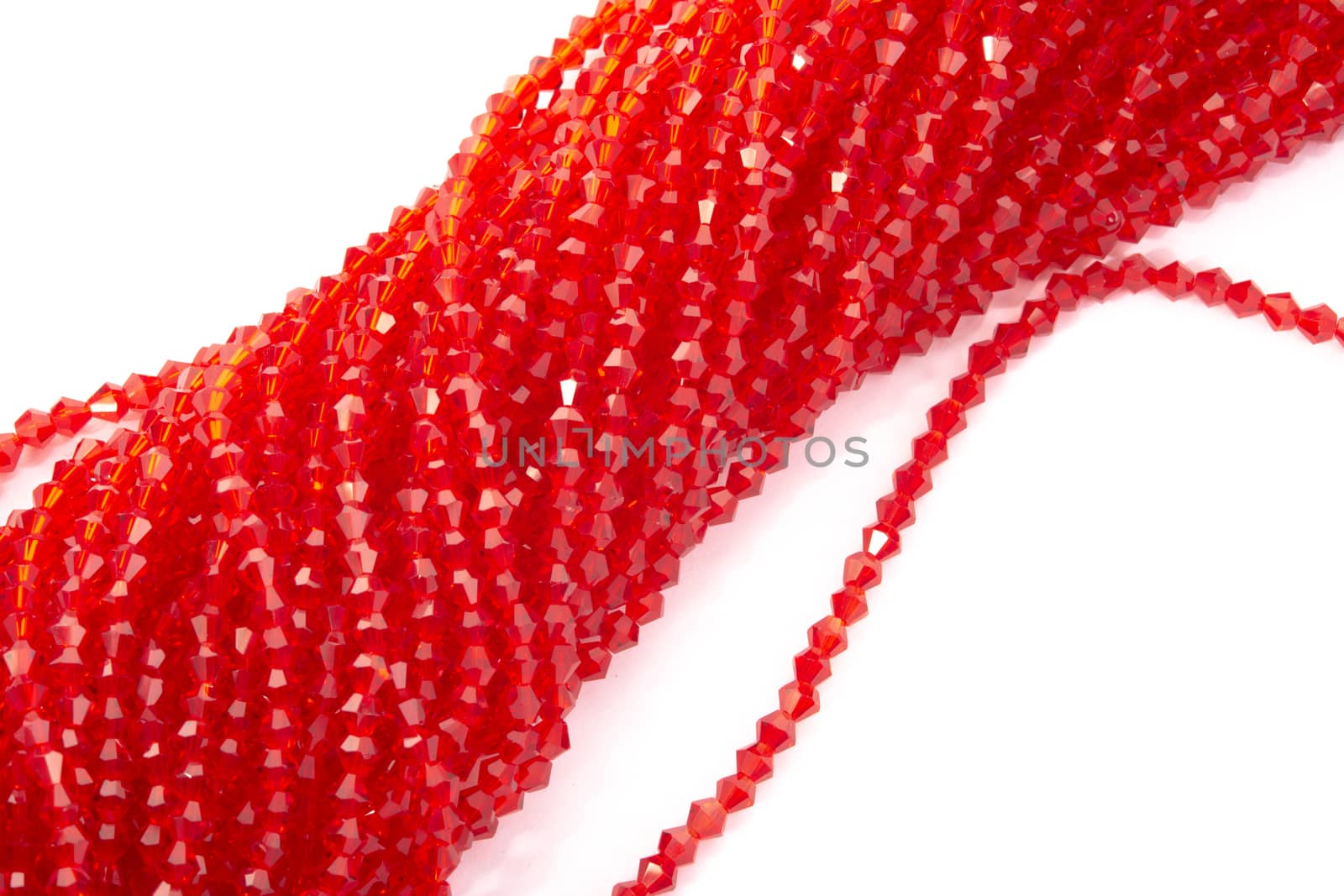 Beautiful Red Glass Sparkle Crystal Isoalted Beads on white background. Use for diy beaded jewelry