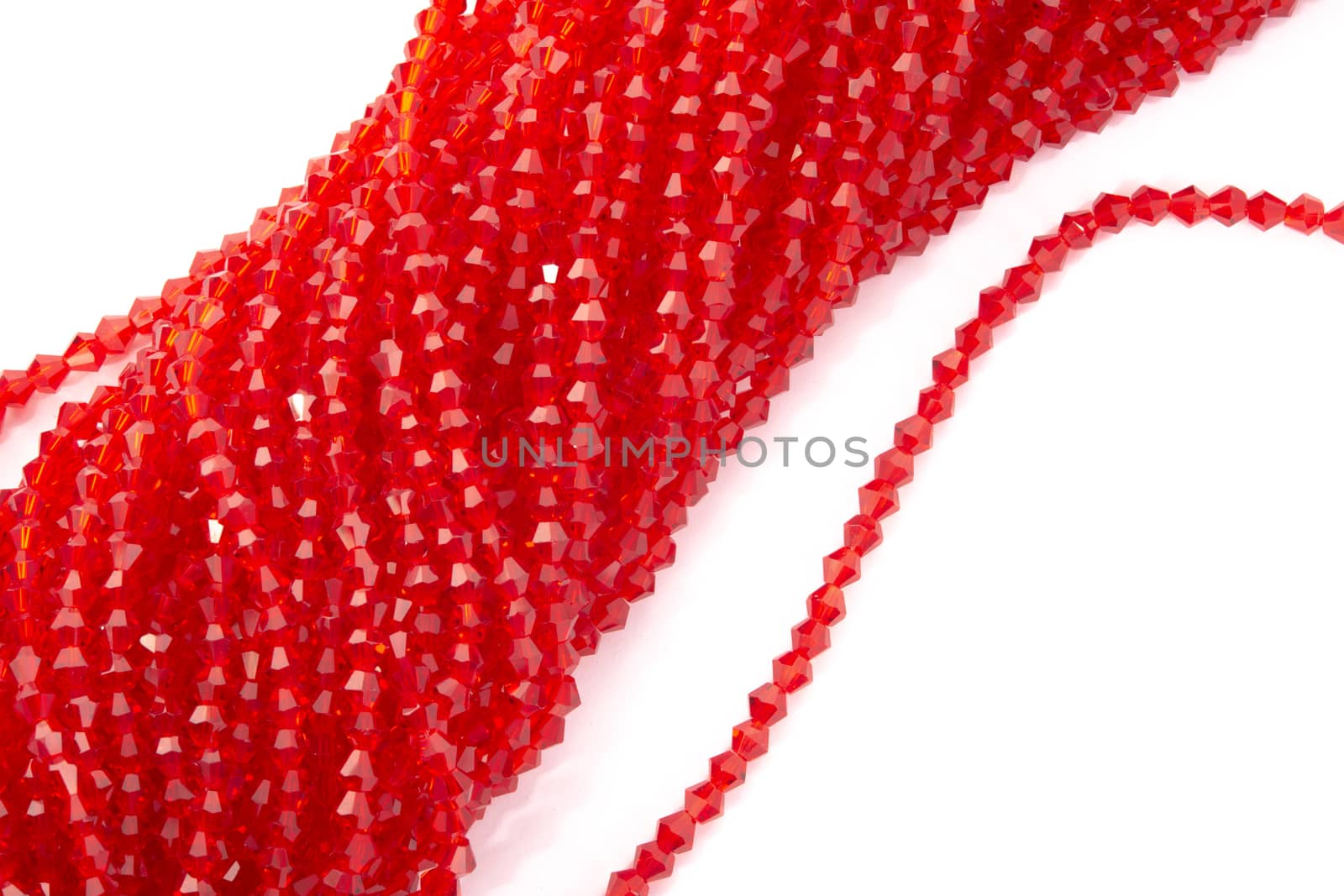 Beautiful Red Glass Sparkle Crystal Isoalted Beads on white background. Use for diy beaded jewelry