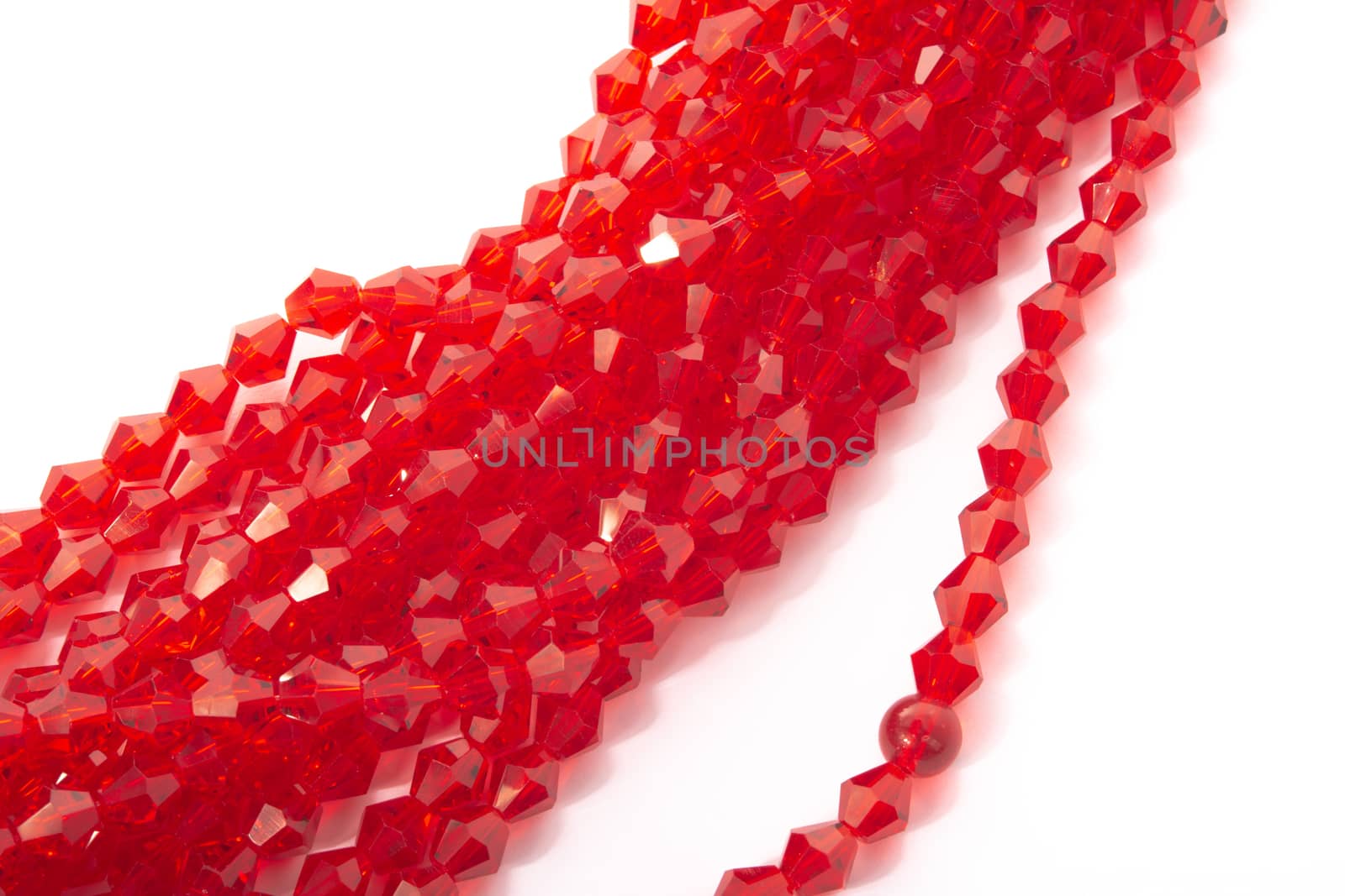 Beautiful Red Glass Sparkle Crystal Isoalted Beads on white background. Use for diy beaded jewelry