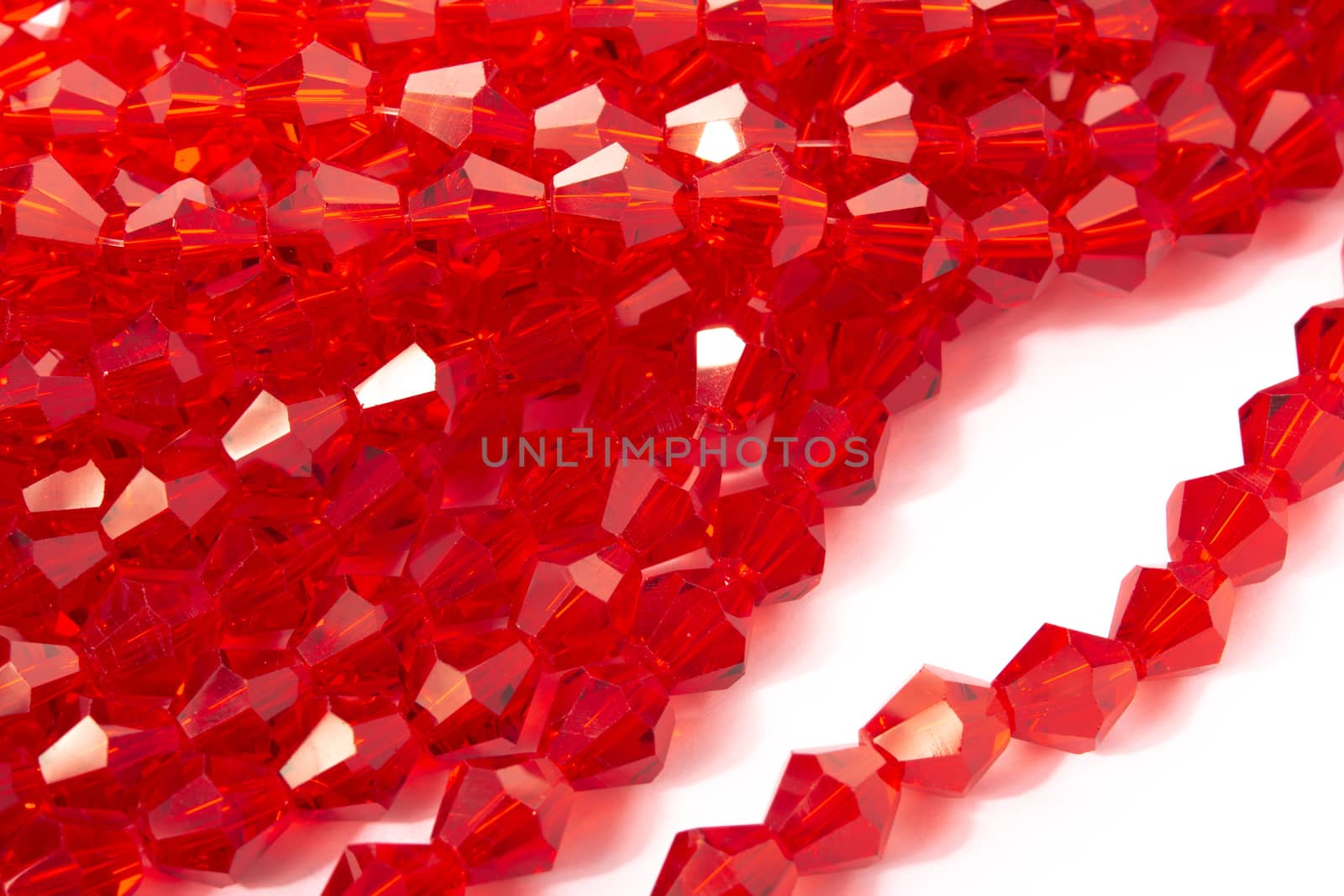 Beautiful Red Glass Sparkle Crystal Isoalted Beads on white background. Use for diy beaded jewelry