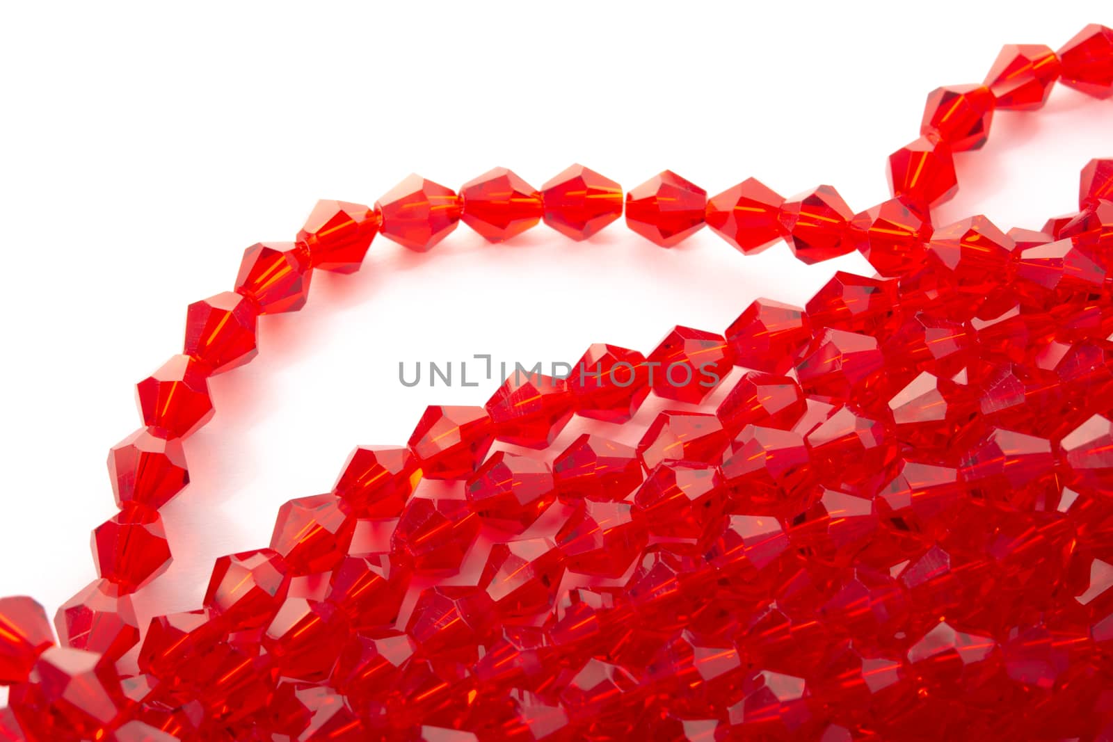 Beautiful Red Glass Sparkle Crystal Isoalted Beads on white background. Use for diy beaded jewelry