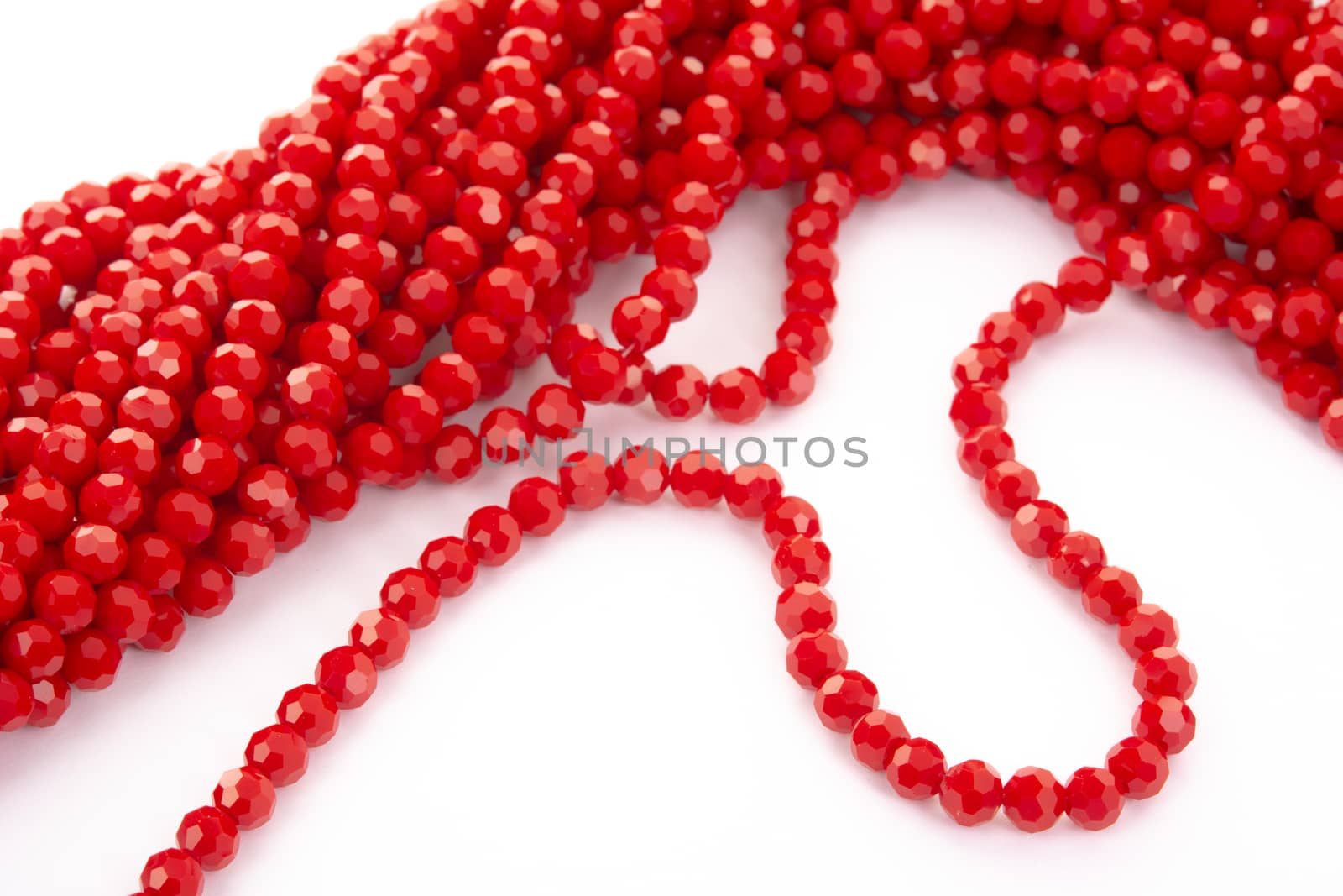 Beautiful Red Glass Sparkle Crystal Isoalted Beads on white background. Use for diy beaded jewelry
