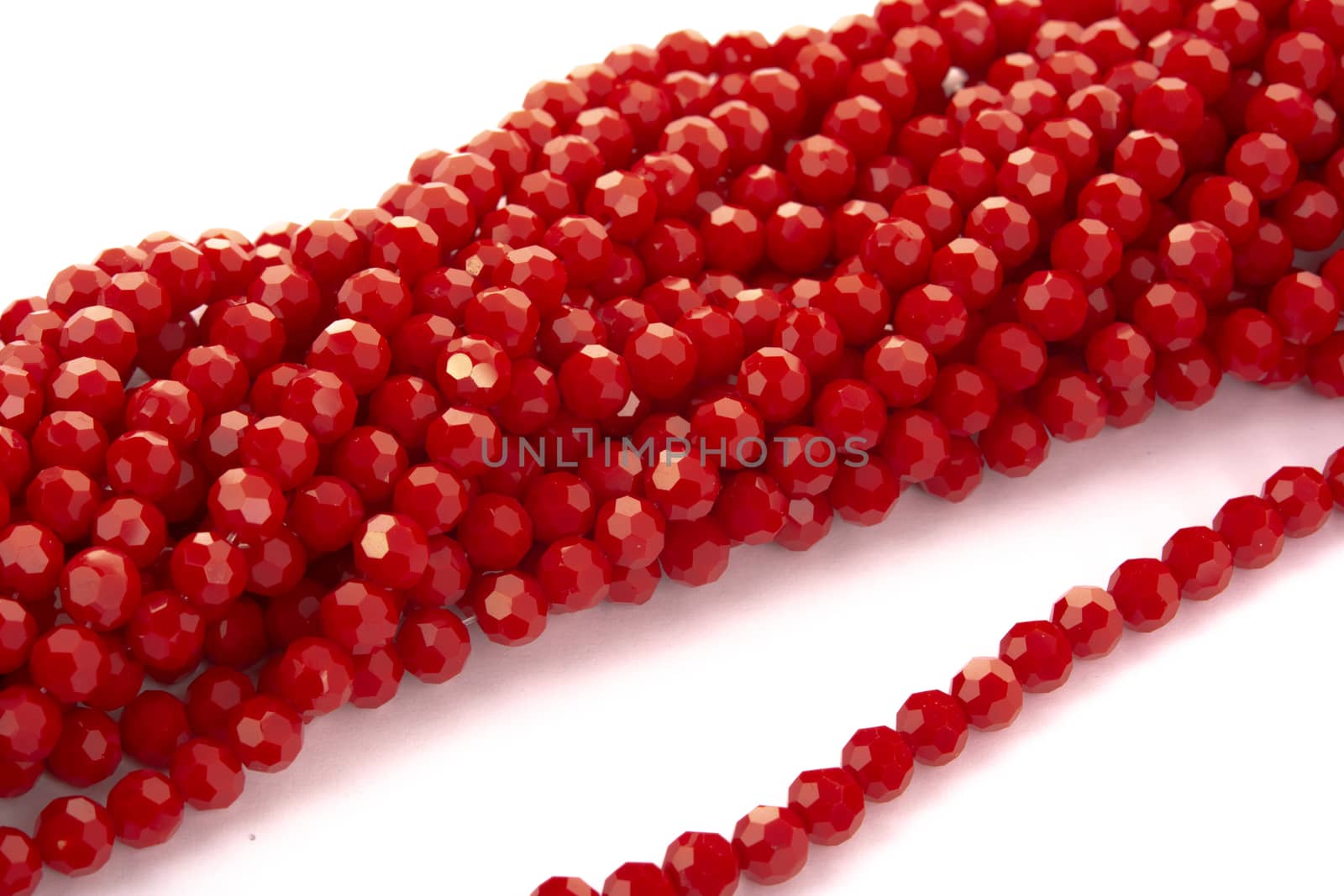 Beautiful Red Glass Sparkle Crystal Isoalted Beads on white background. Use for diy beaded jewelry