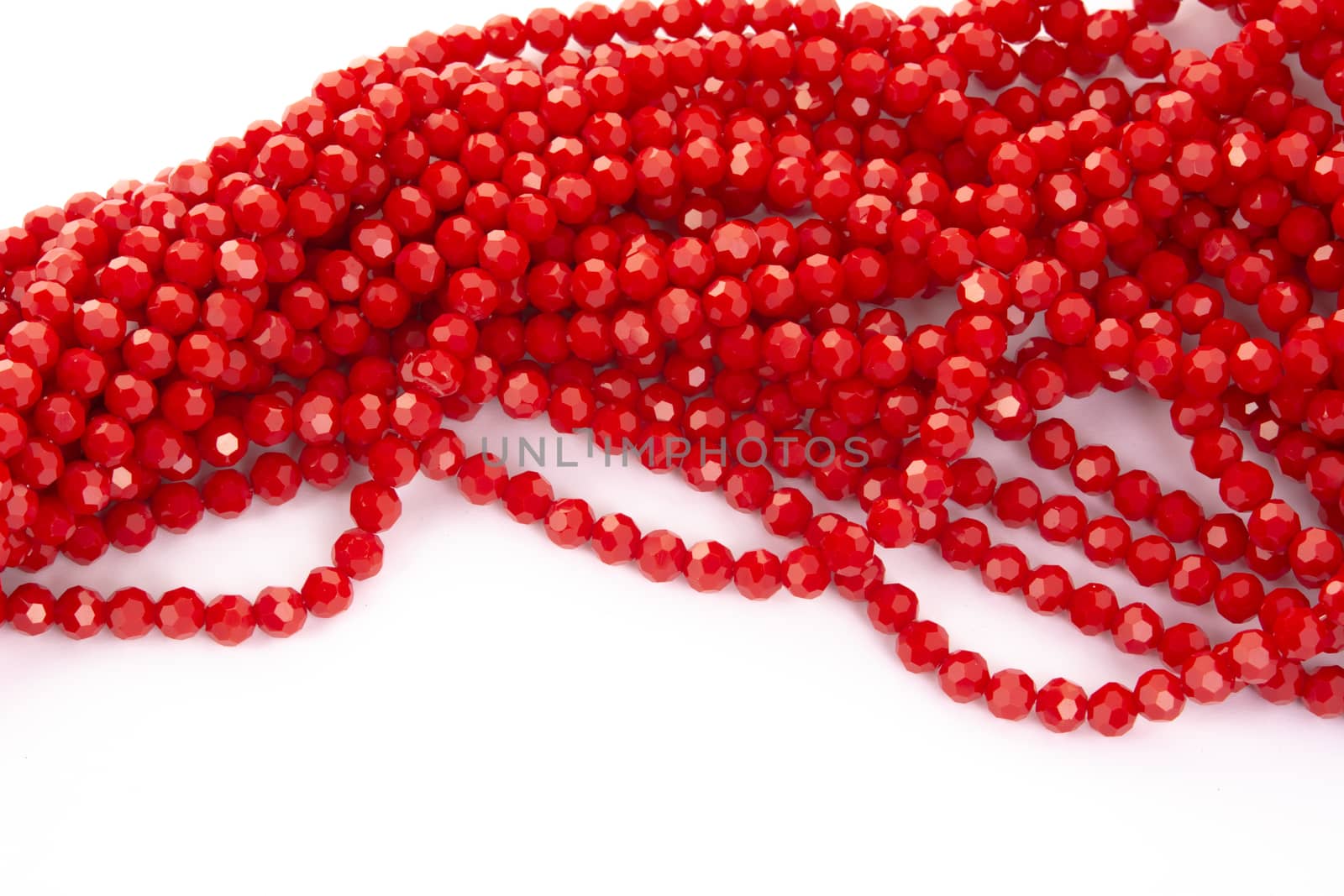 Beautiful Red Glass Sparkle Crystal Isoalted Beads on white background. Use for diy beaded jewelry