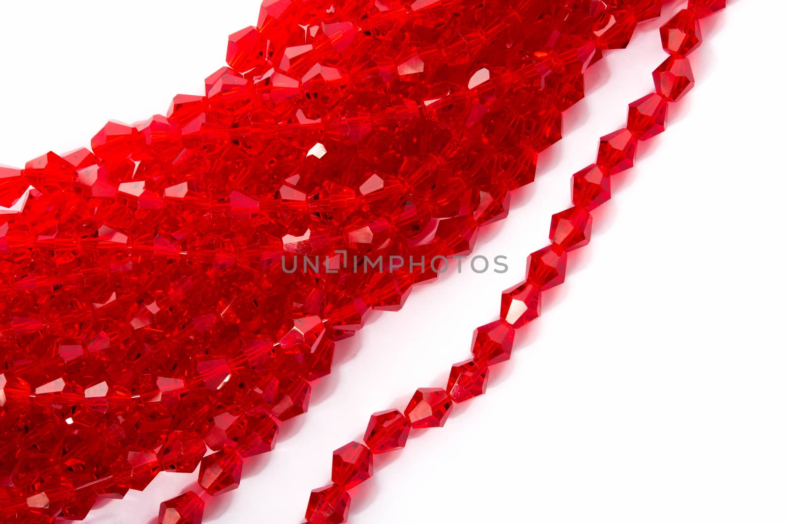 Beautiful Red Glass Sparkle Crystal Isoalted Beads on white background. Use for diy beaded jewelry