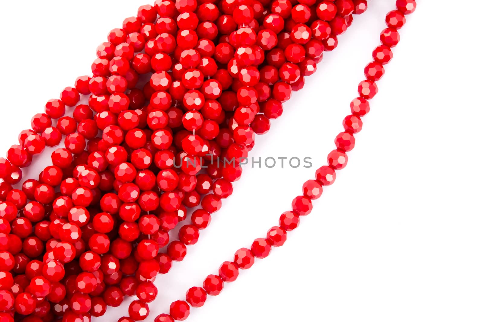 Beautiful Red Glass Sparkle Crystal Isoalted Beads on white background. Use for diy beaded jewelry