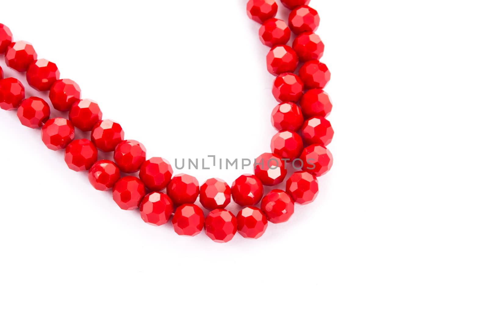 Beautiful Red Glass Sparkle Crystal Isoalted Beads on white background. Use for diy beaded jewelry