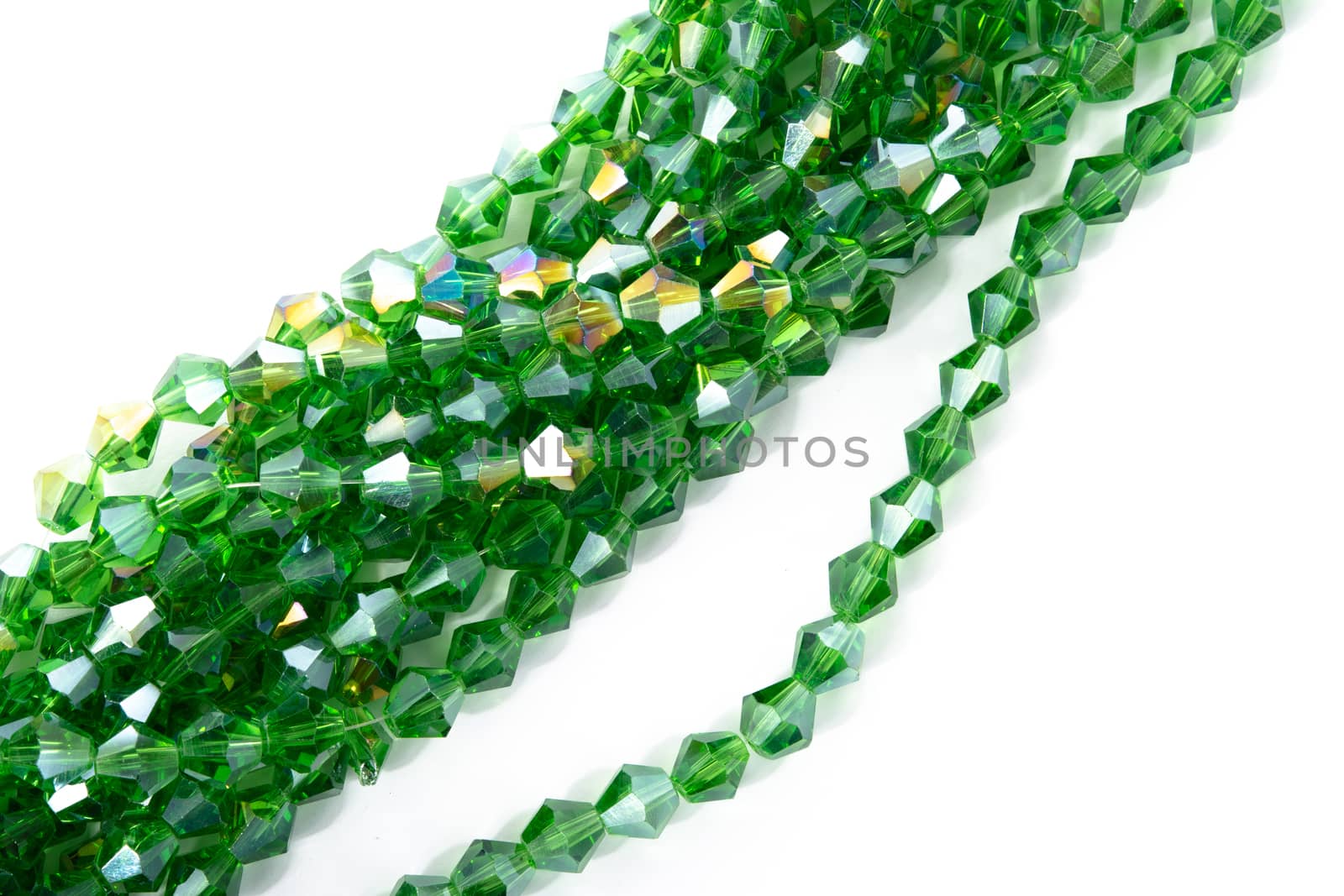 Beautiful Light green Glass Sparkle Crystal Isoalted Beads on white background. Use for diy beaded jewelry