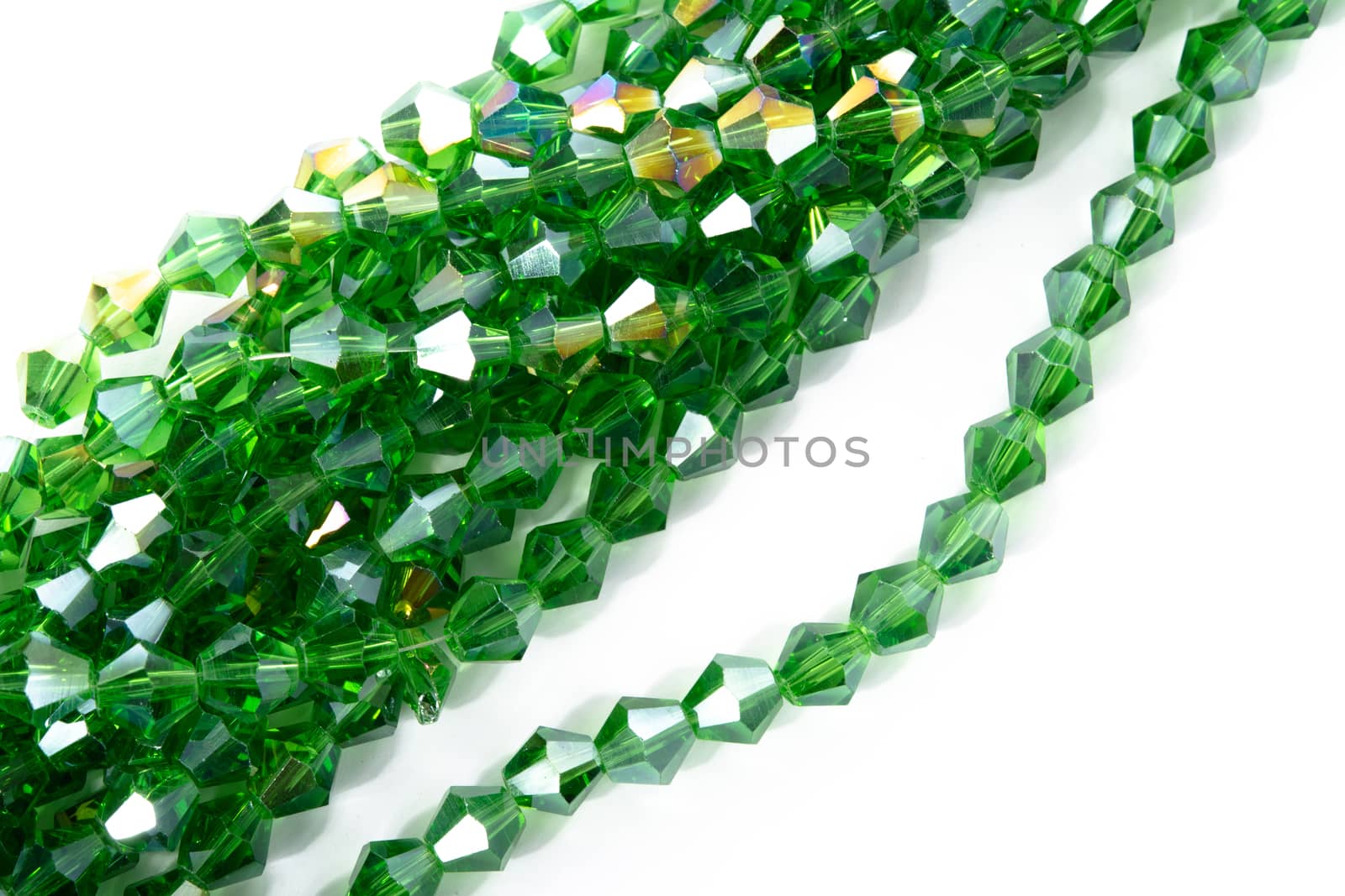 Beautiful Light green Glass Sparkle Crystal Isoalted Beads on white background. Use for diy beaded jewelry