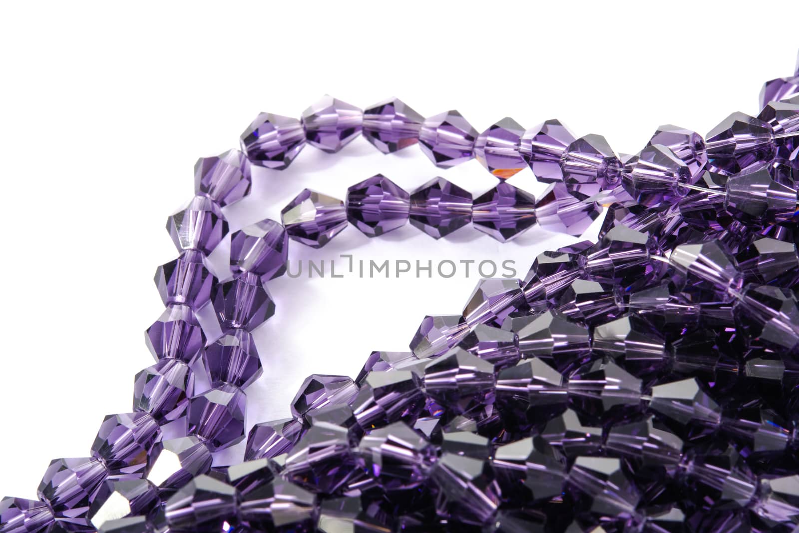 Beautiful Light purple Glass Sparkle Crystal Isoalted Beads on white background. Use for diy beaded jewelry