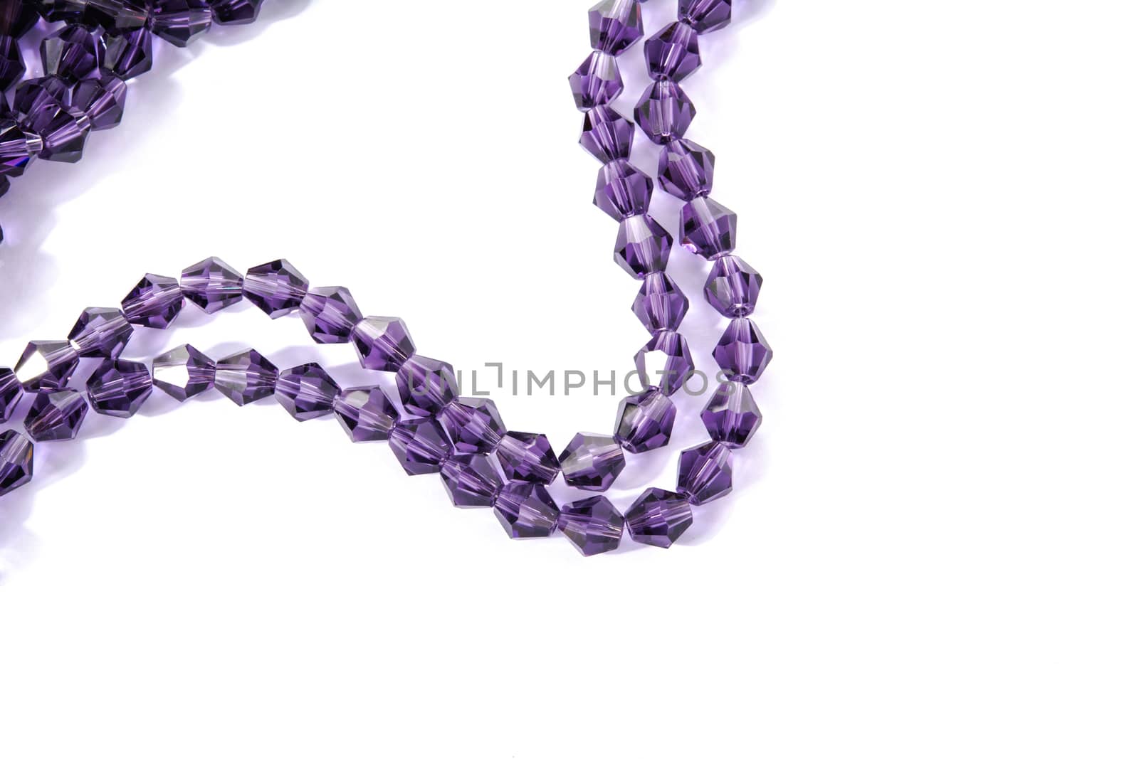 Beautiful Light purple Glass Sparkle Crystal Isoalted Beads on white background. Use for diy beaded jewelry