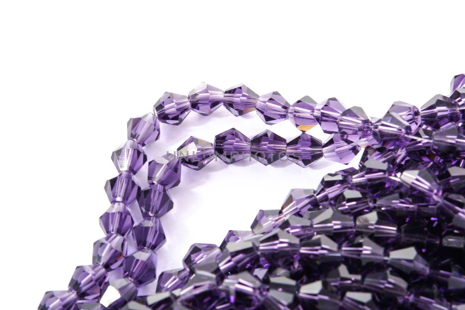 Beautiful Light purple Glass Sparkle Crystal Isoalted Beads on white background. Use for diy beaded jewelry