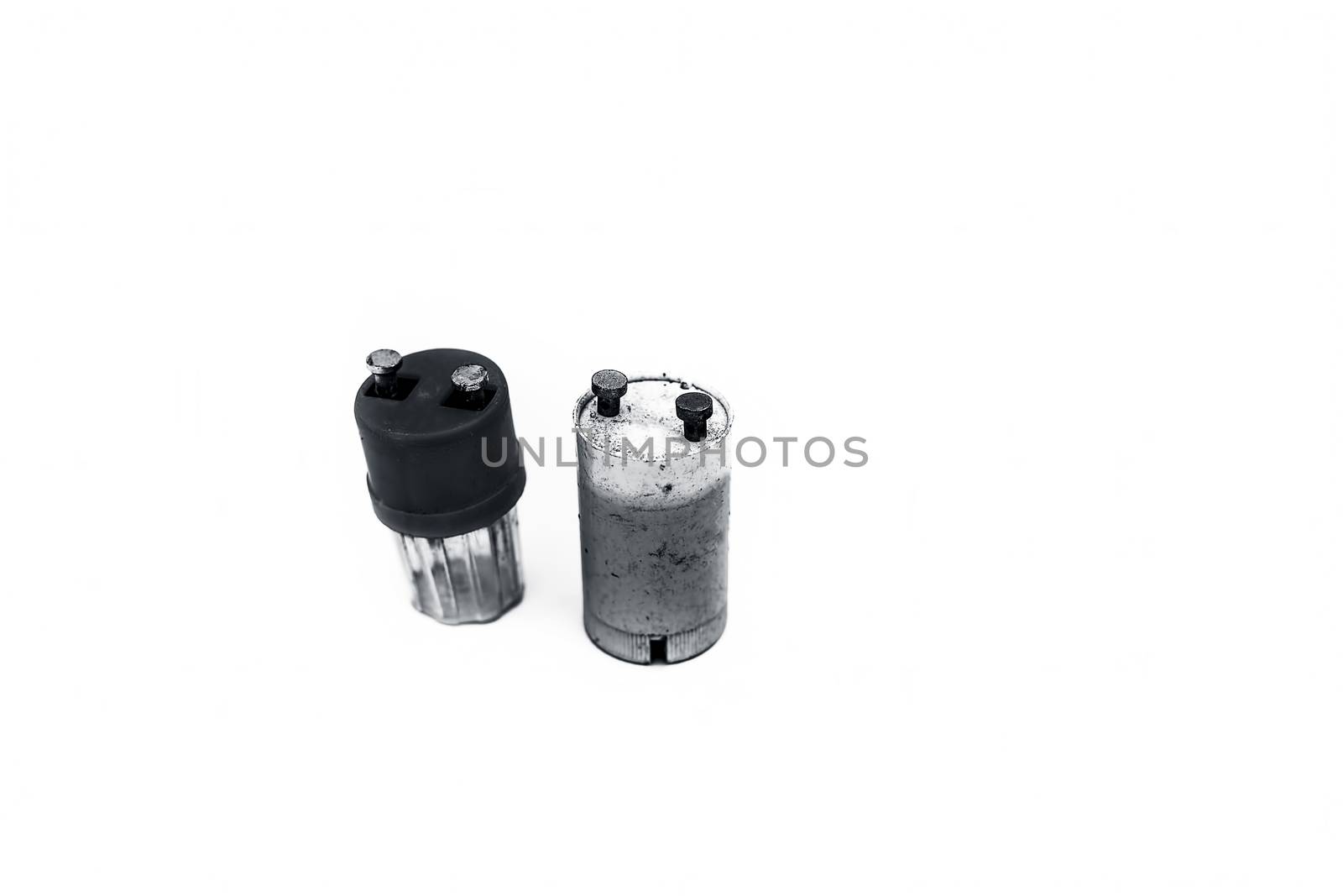 Close up of plastic colorful capacitors or stators isolated on white widely used in old types of Flour scent. by mirzamlk