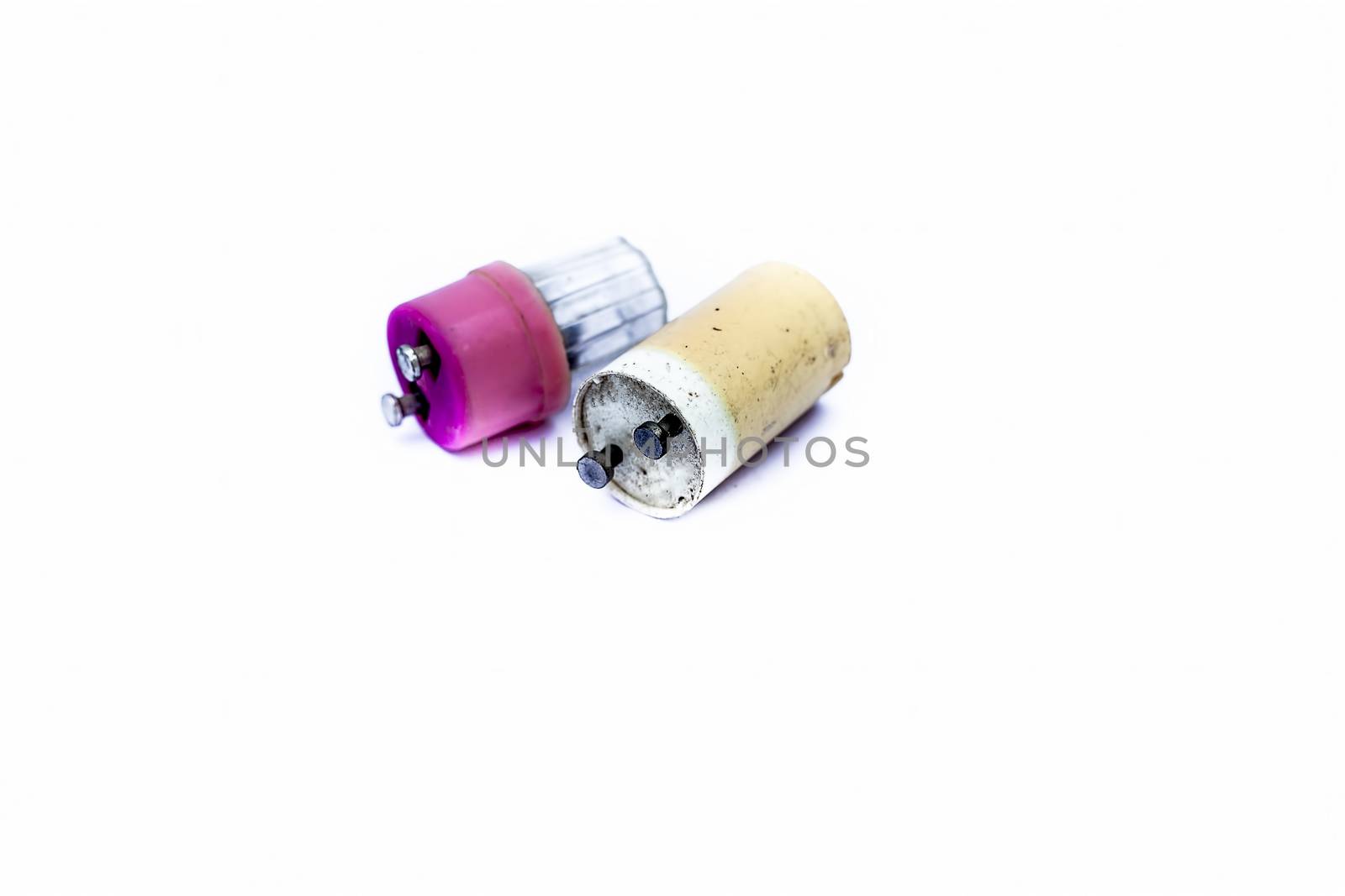 Close up of plastic colorful capacitors or stators isolated on white widely used in old types of Flour scent.