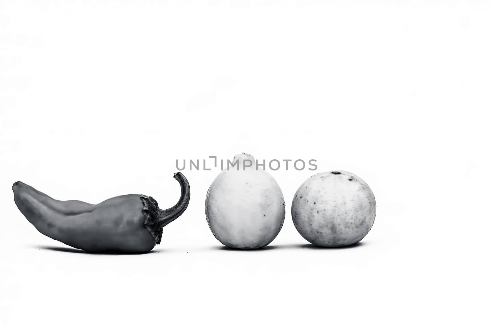 Close up of fresh raw Lemon and chilies isolated on white. by mirzamlk