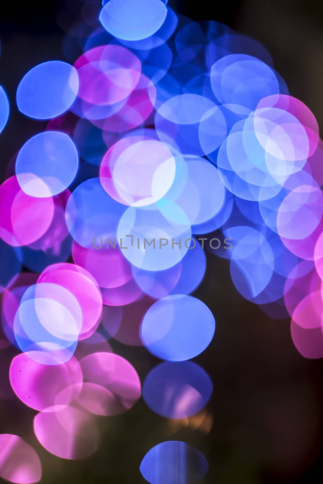 Close up of bokeh background of Christmas lights or new year celebration used as background or texture for designing and for photo manipulation.